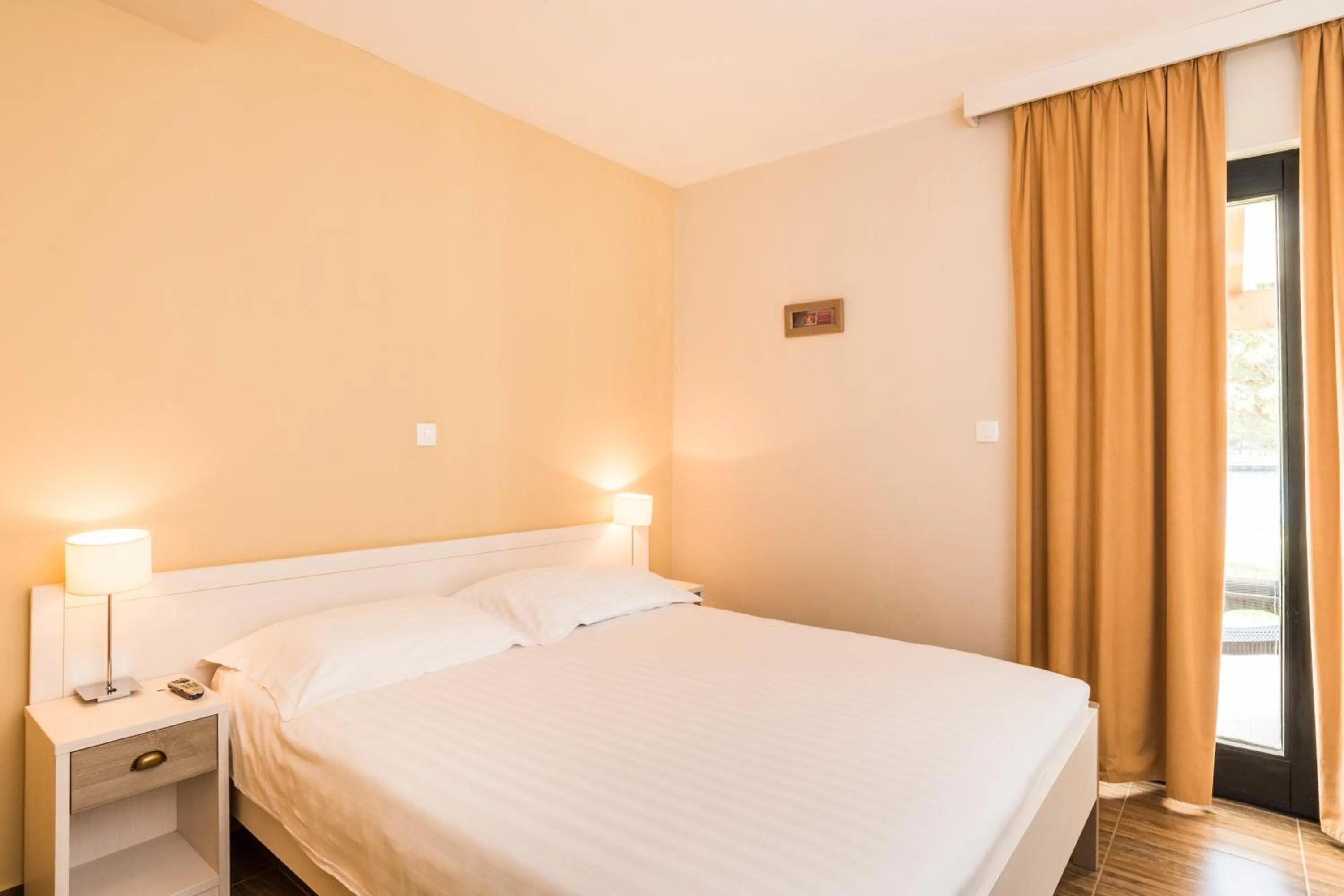 Bed in Apartments Amfora Plava Laguna