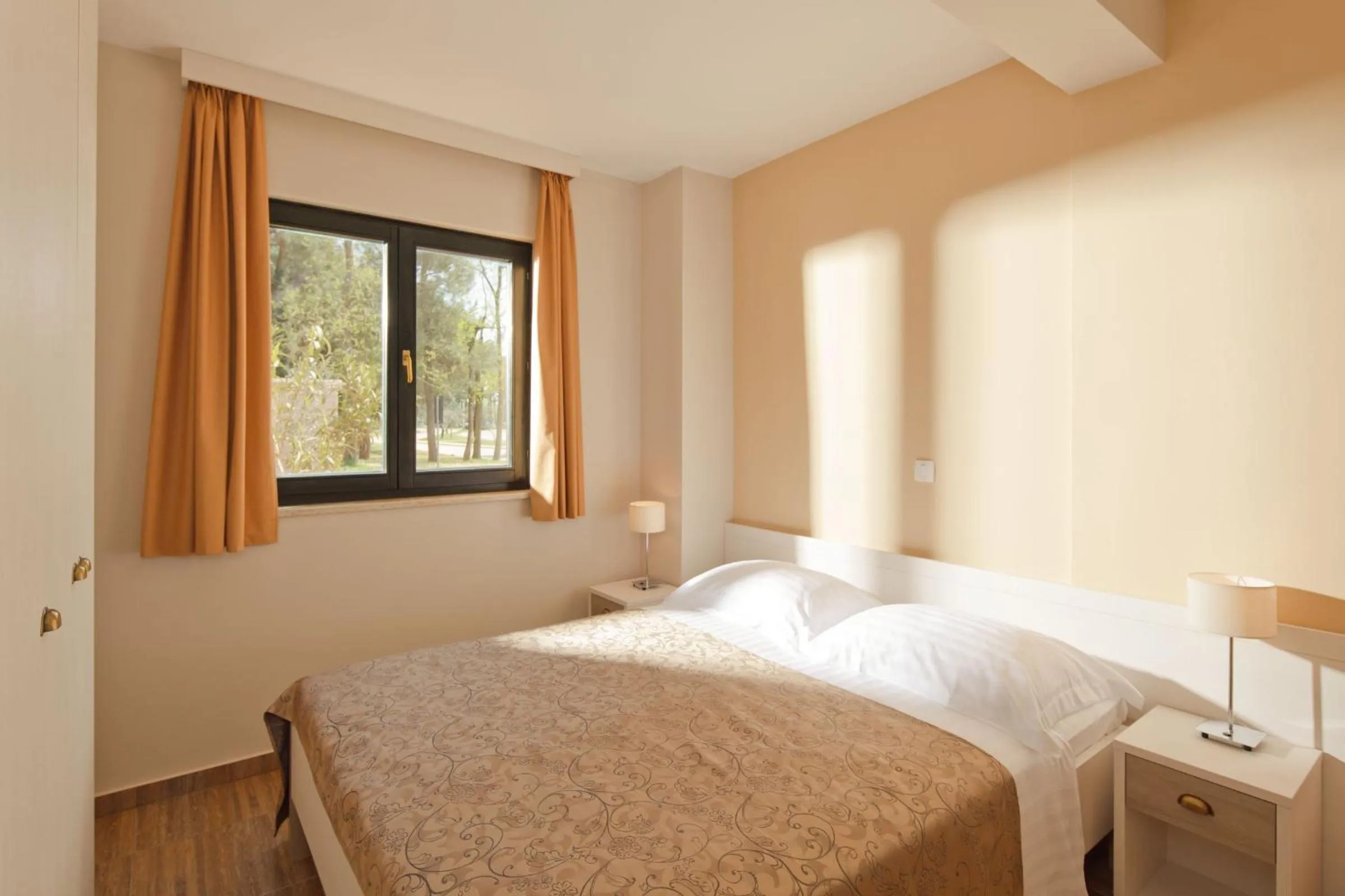Bed in Apartments Amfora Plava Laguna