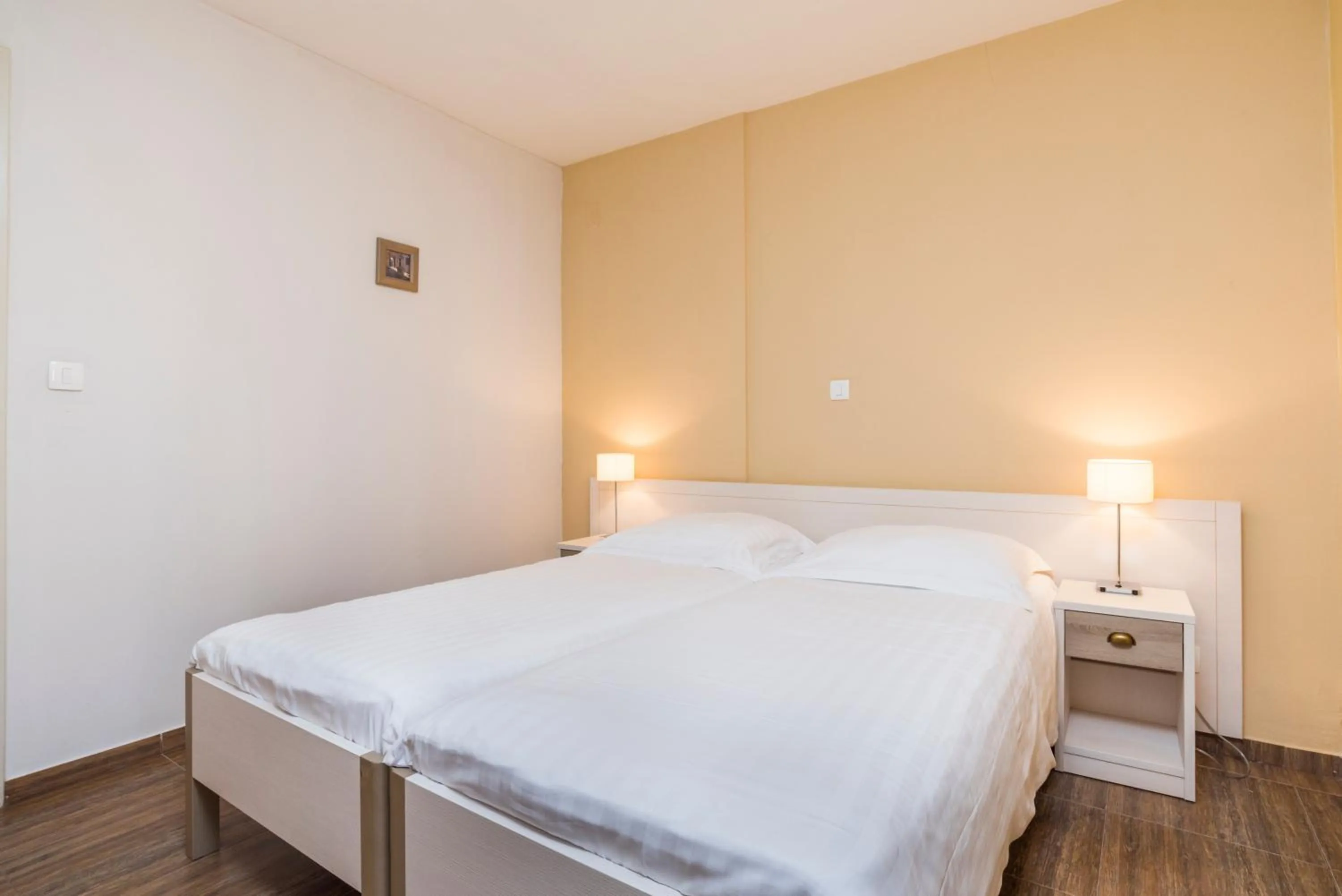 Bed in Apartments Amfora Plava Laguna