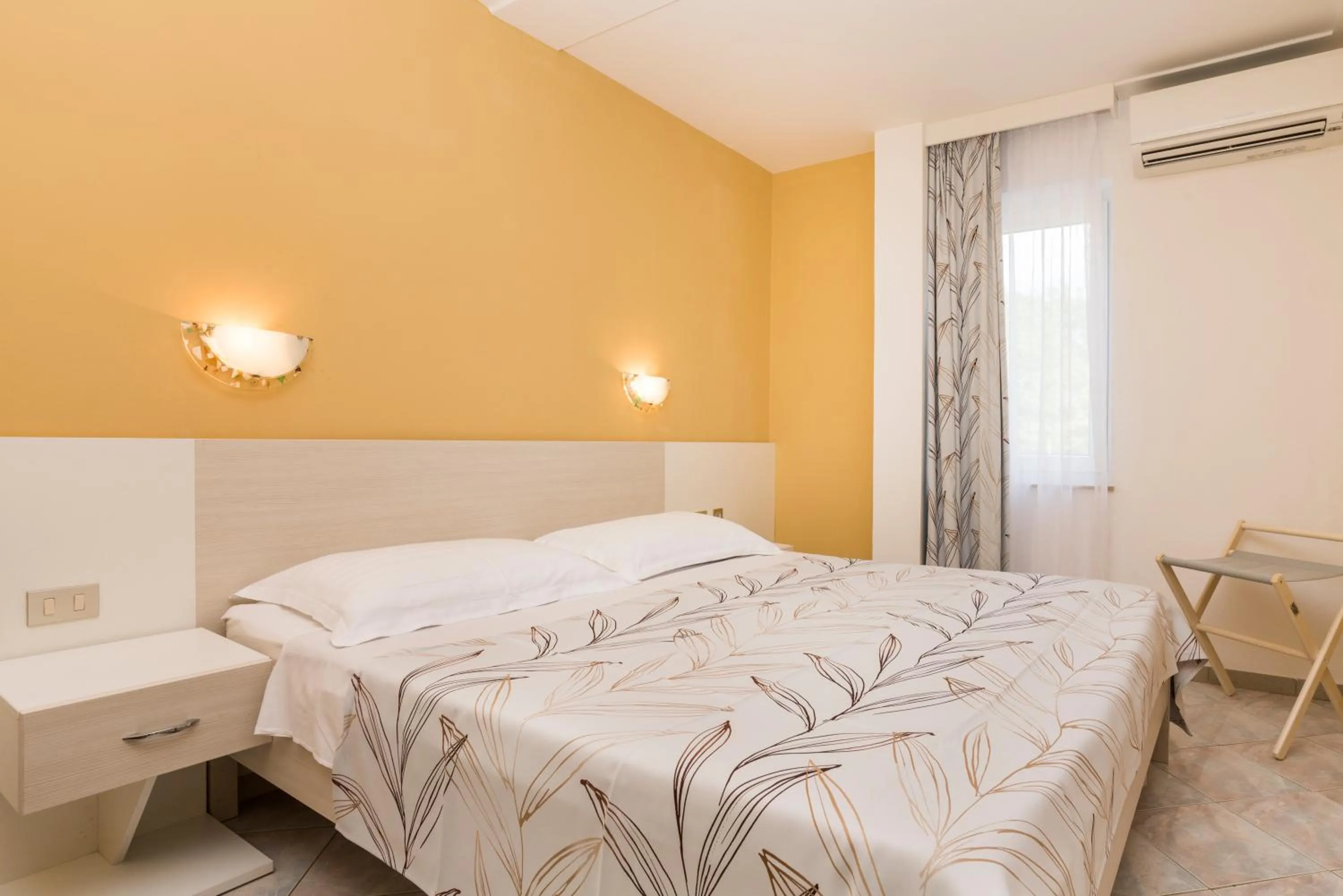 Bed in Apartments Amfora Plava Laguna