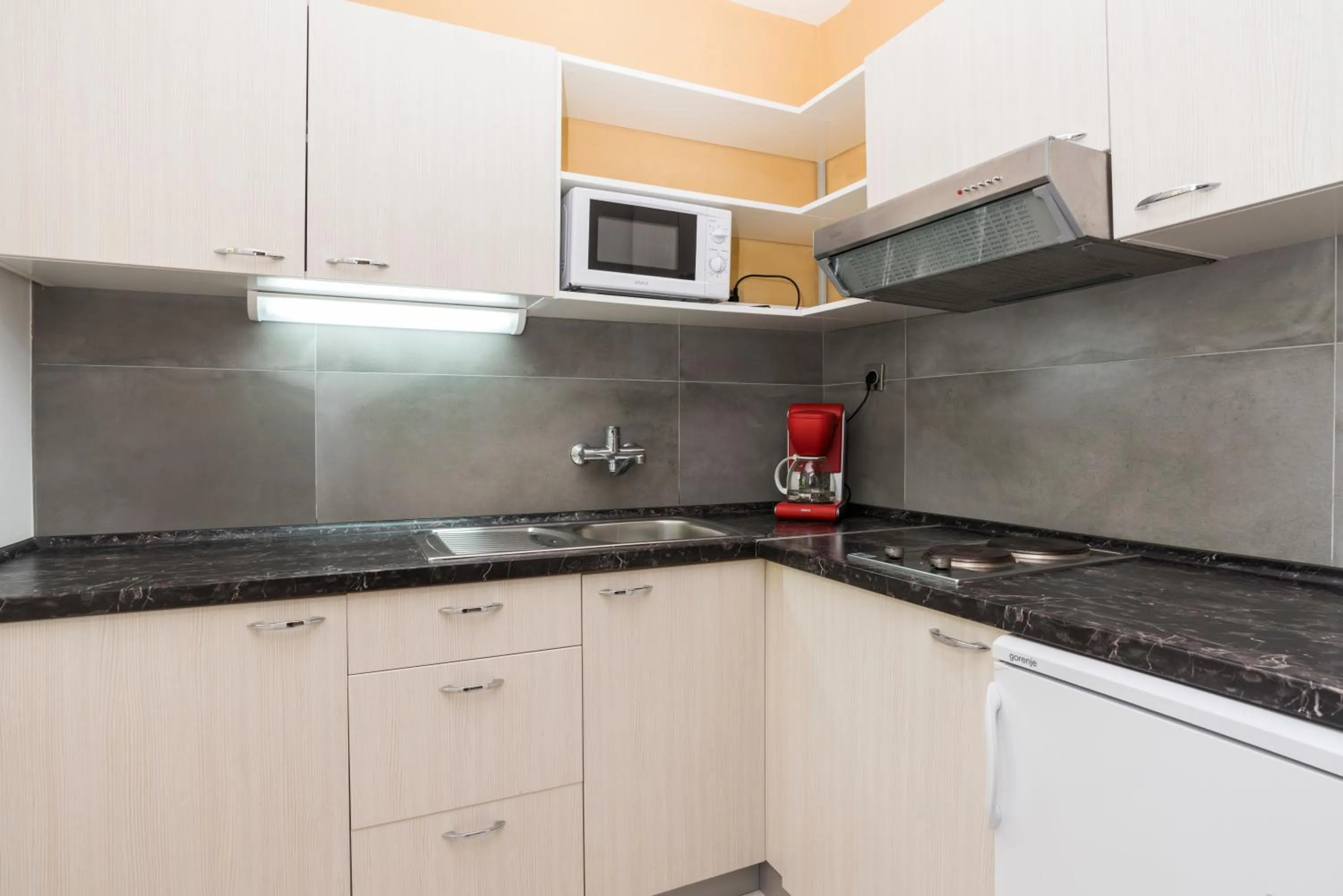 Kitchen or kitchenette in Apartments Amfora Plava Laguna