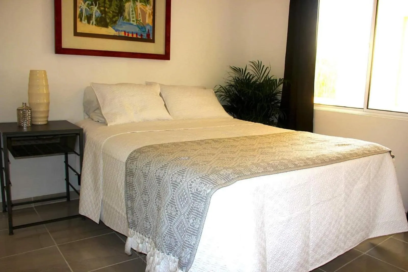 Bed in AMAXING Cancun Airport