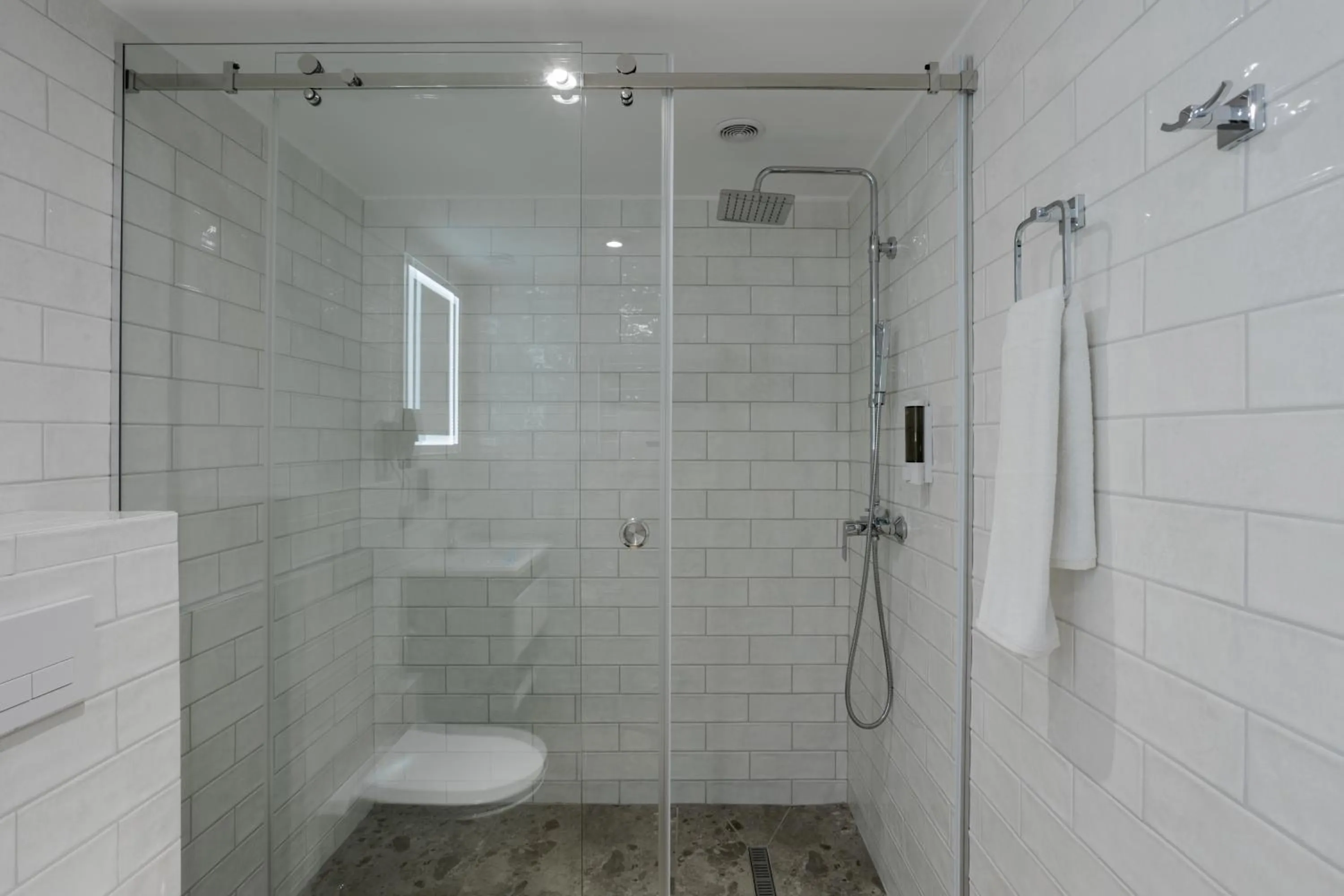 Shower in Tulip Residence & Spa Hotel