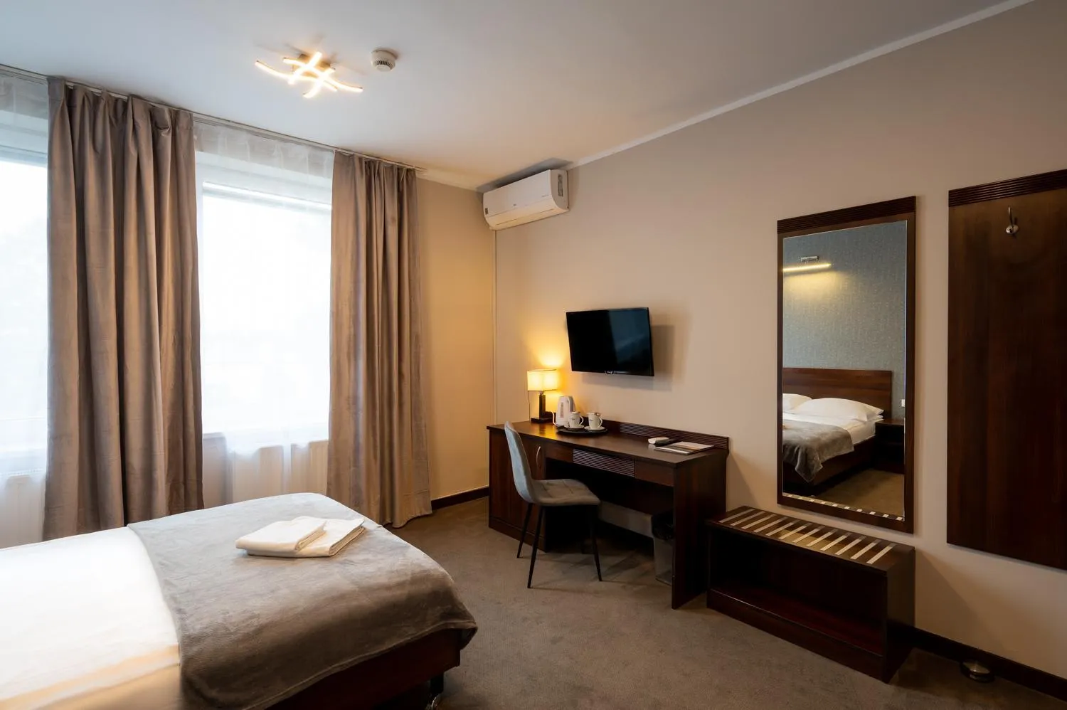 Bed in Hotel Pod Jesiotrem