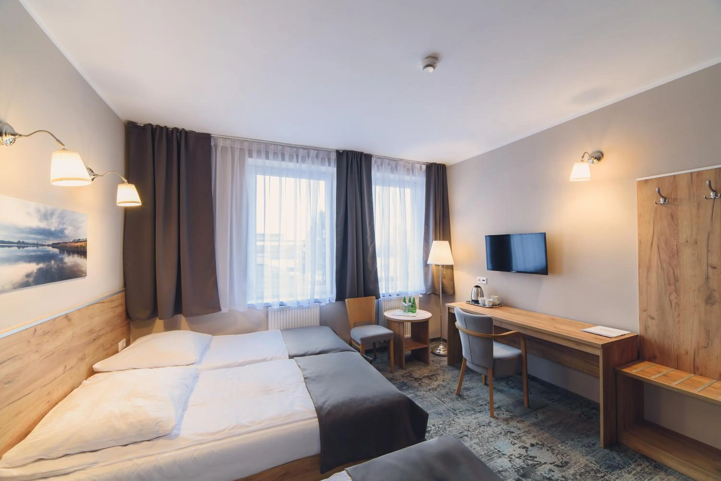 Bed in Hotel Pod Jesiotrem