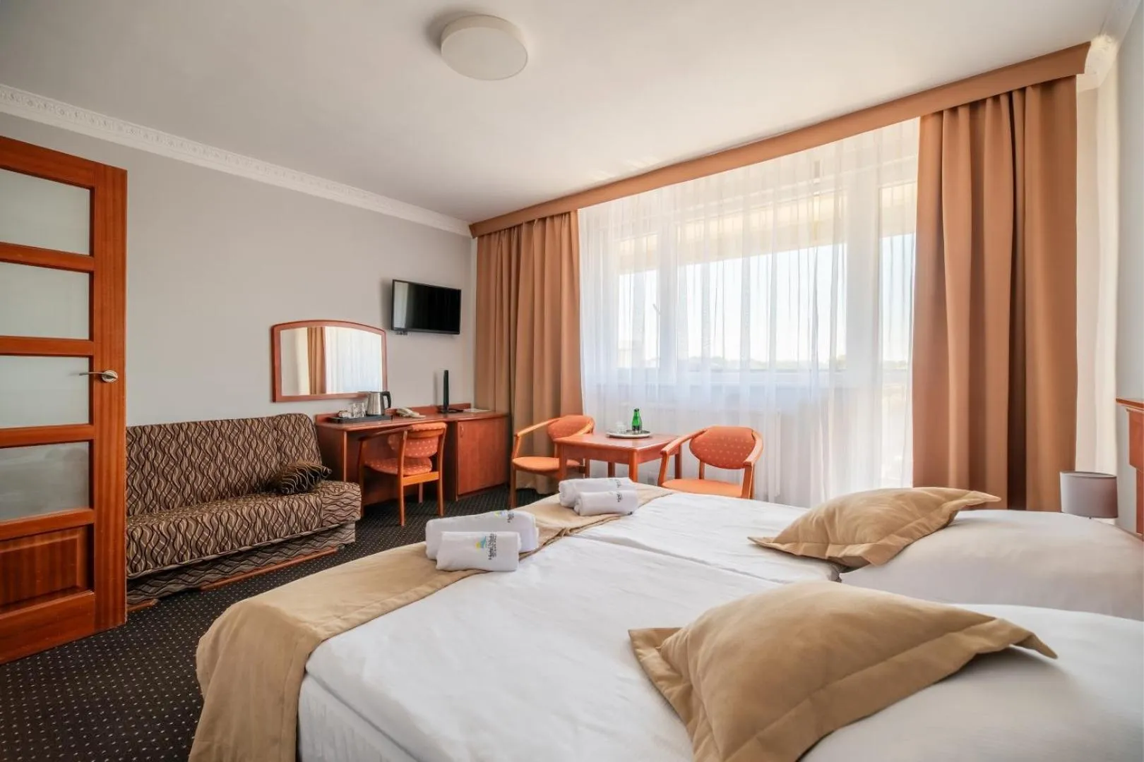 Bed in Hotel Wodnik Twój Hotel z widokiem na morze