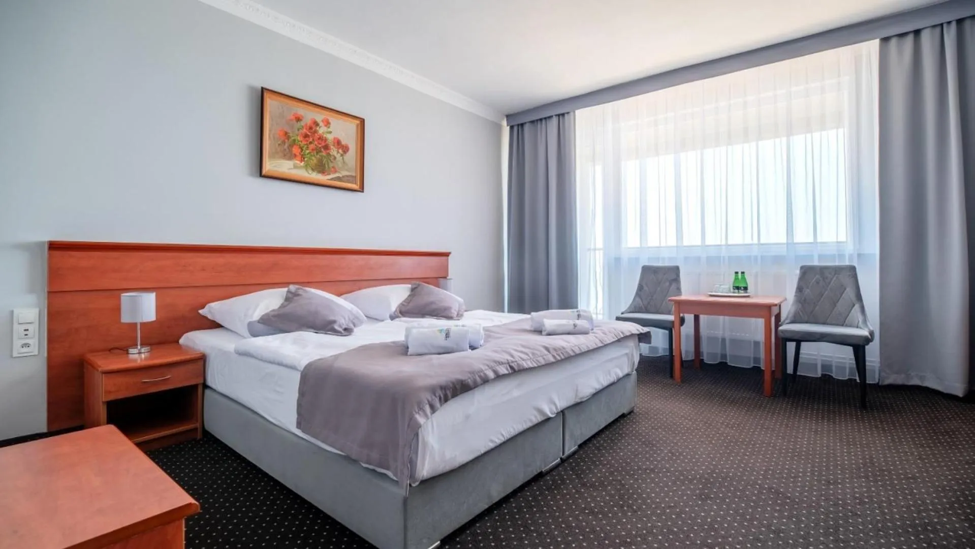 Bed in Hotel Wodnik Twój Hotel z widokiem na morze