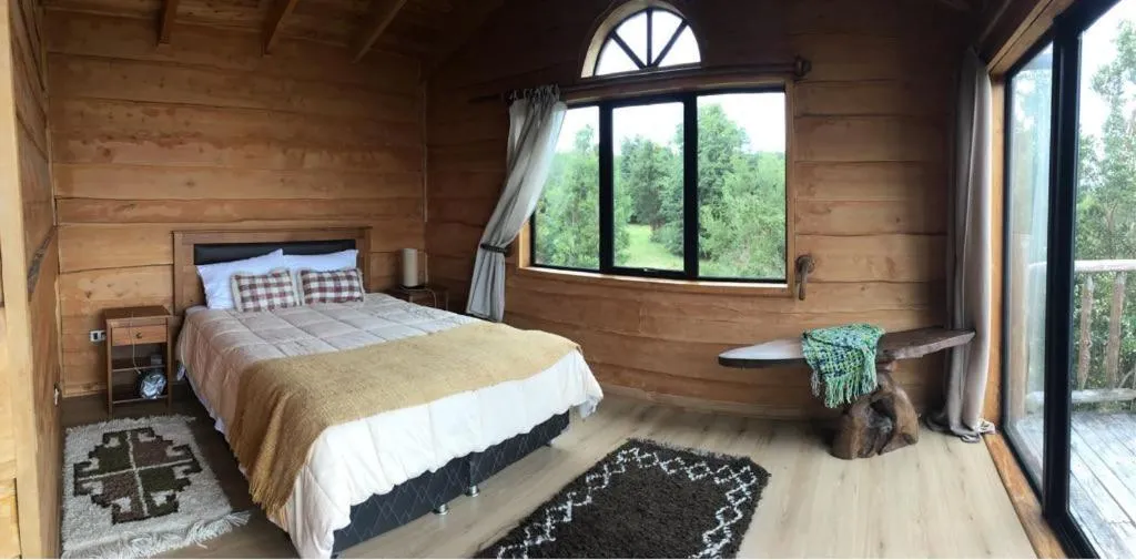 Photo of the whole room, Bed in Kiyen Rupu Huillinco Chiloé
