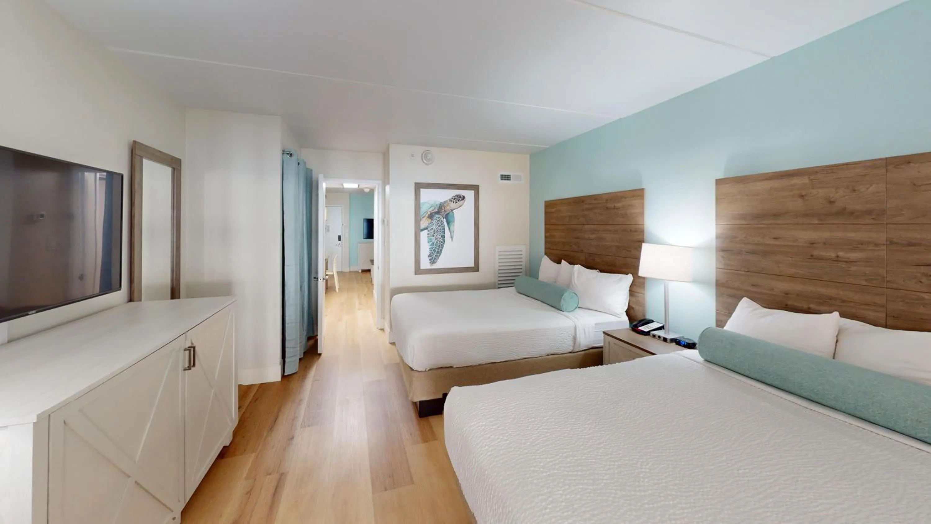 Bed in Princess Royale Oceanfront Resort