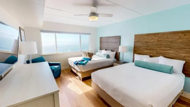 Bed in Princess Royale Oceanfront Resort