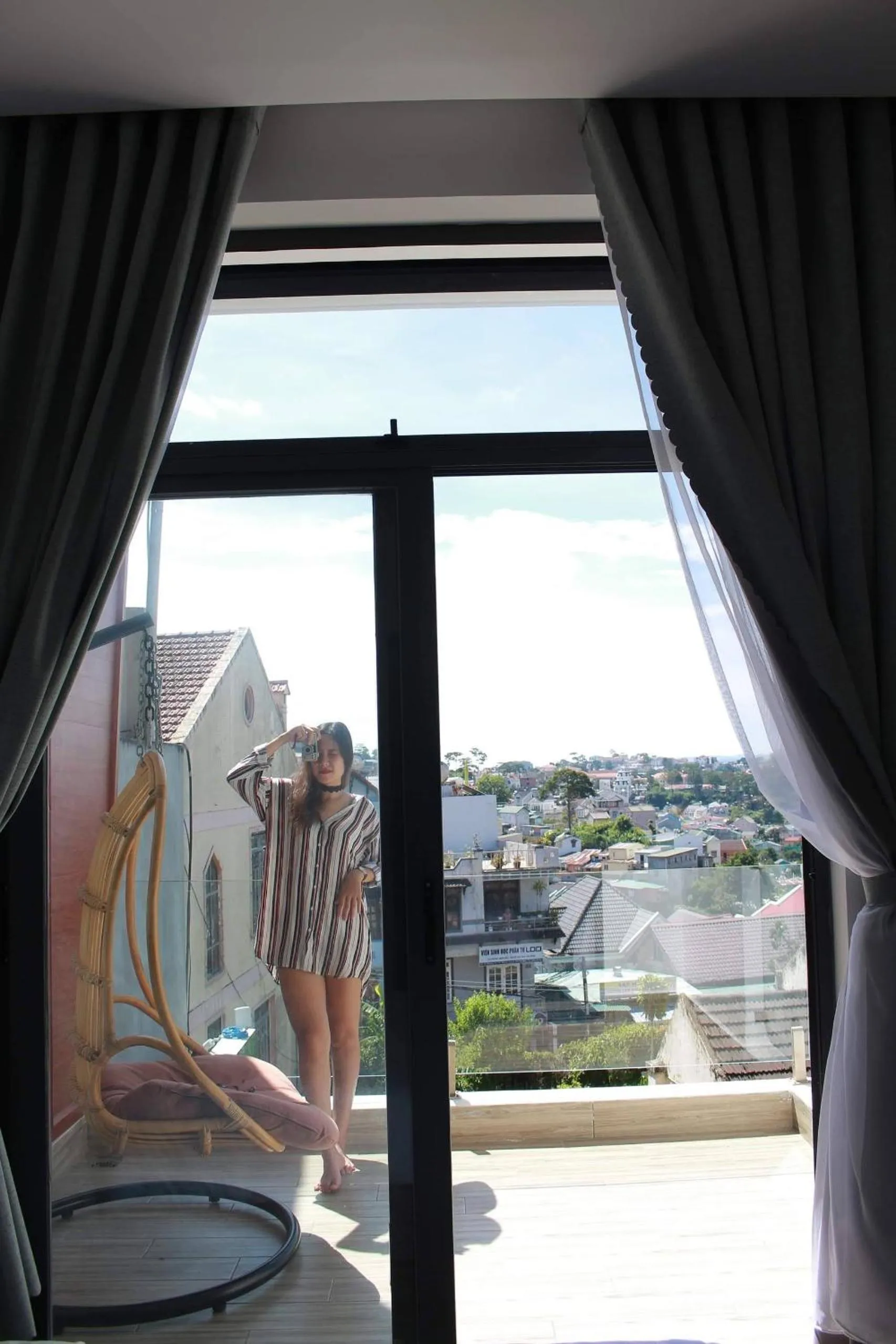 Communal lounge/ TV room in Dalat Memory Inn