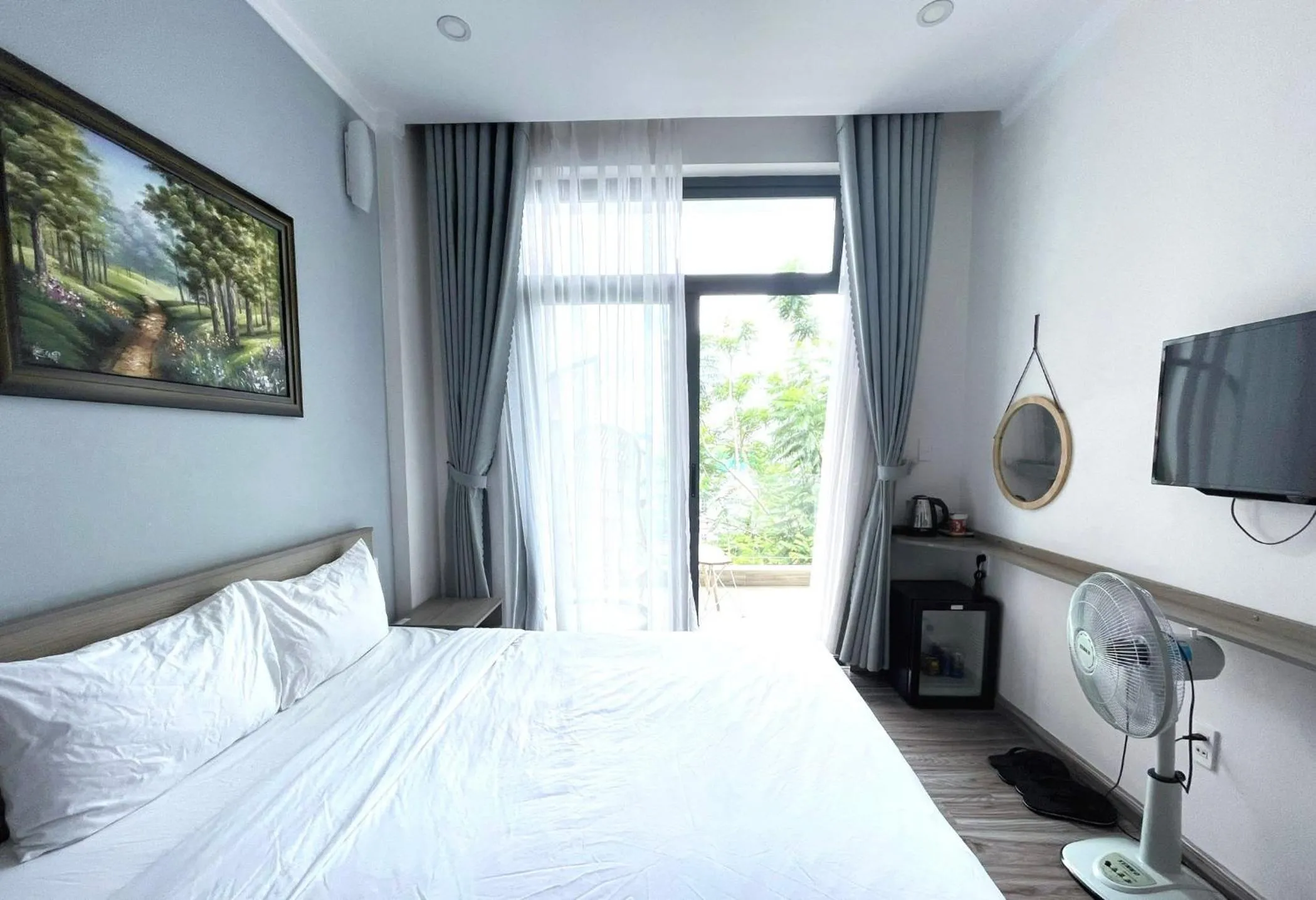 Communal lounge/ TV room, Bed in Dalat Memory Inn