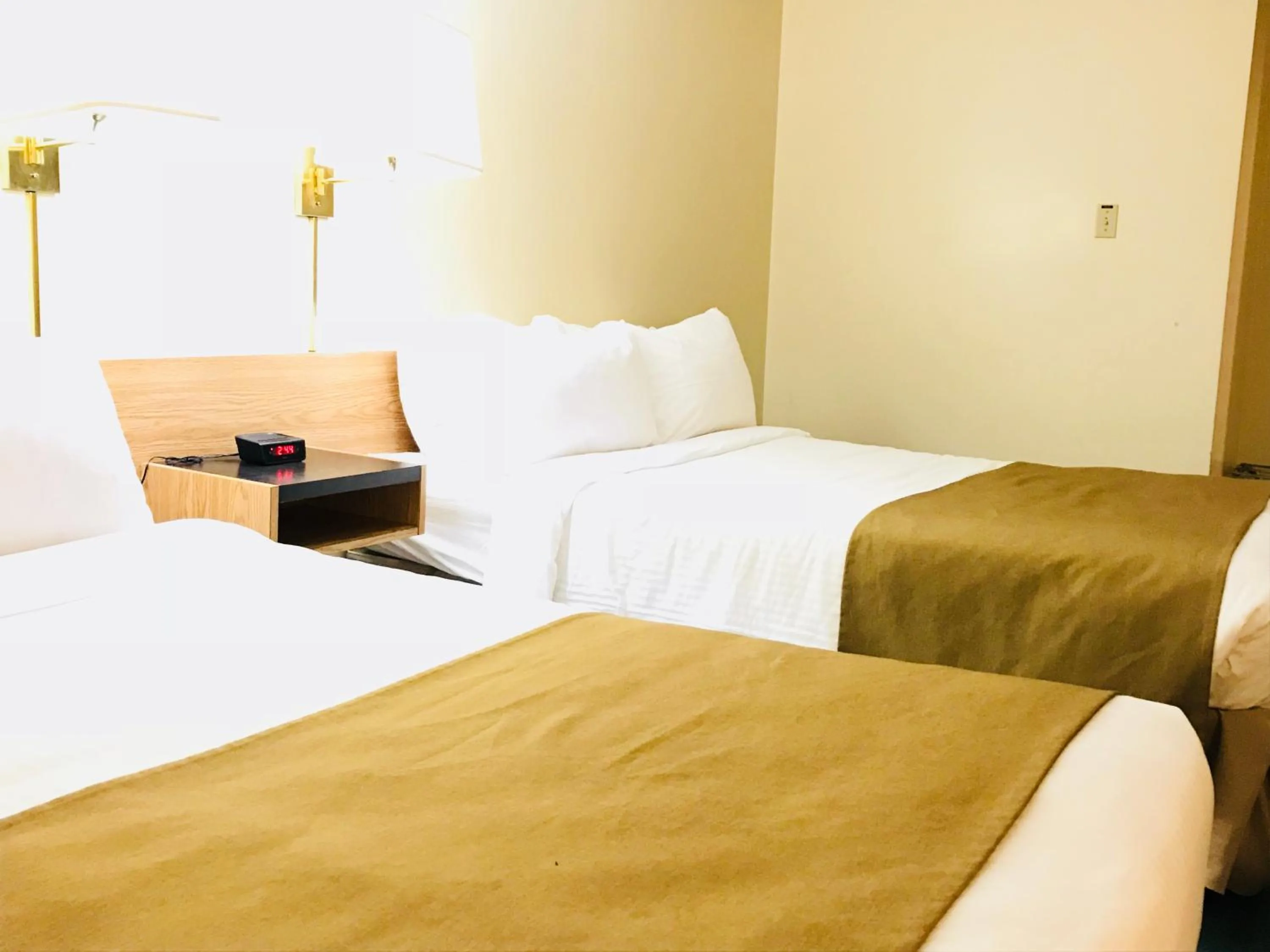 Bed in Northern Star Hotel & Convention Center