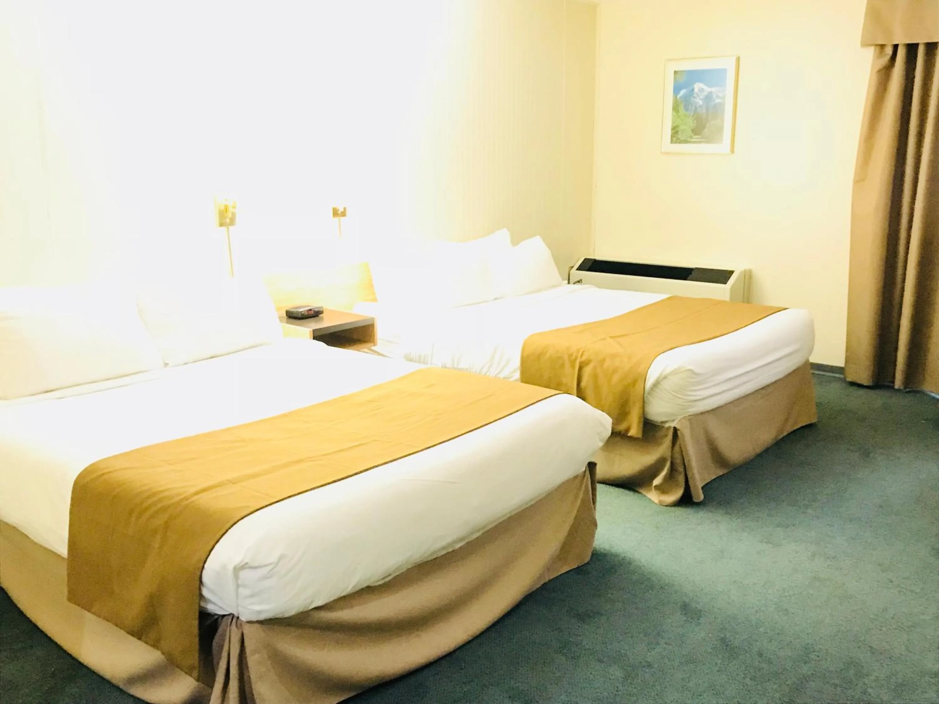 Bed in Northern Star Hotel & Convention Center