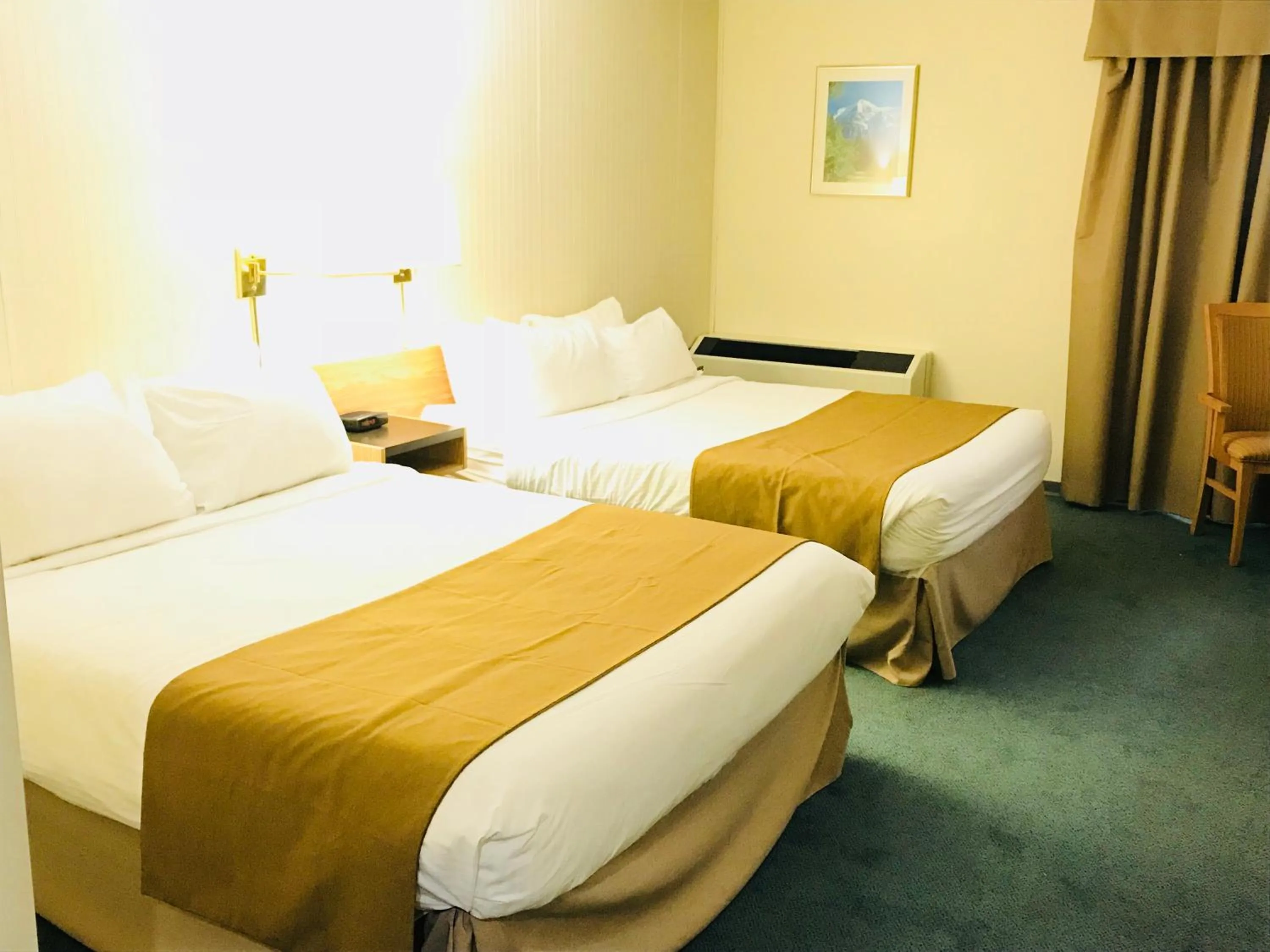 Bed in Northern Star Hotel & Convention Center