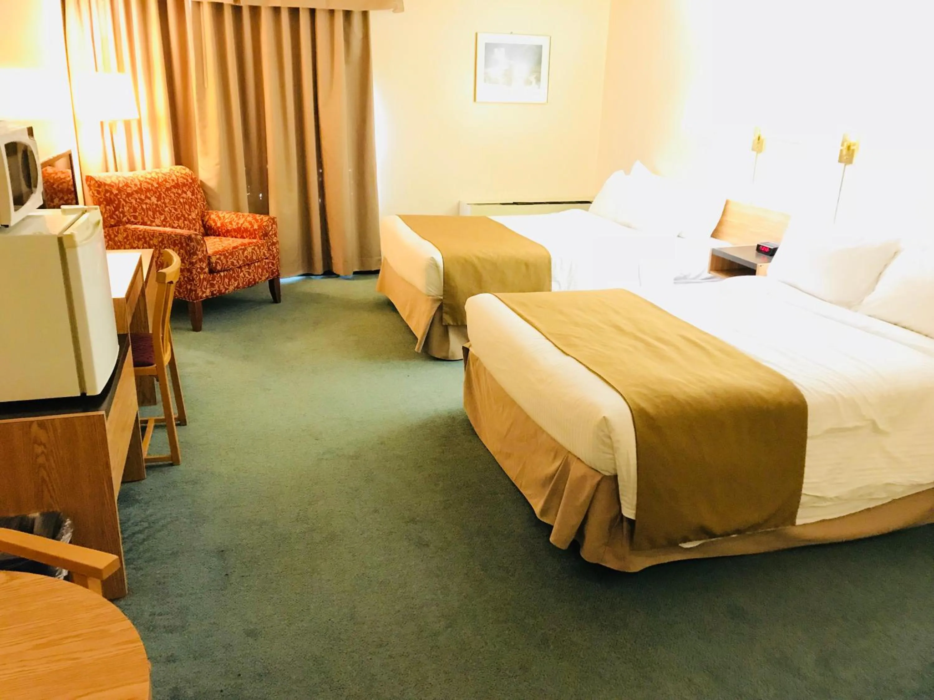 Bed in Northern Star Hotel & Convention Center