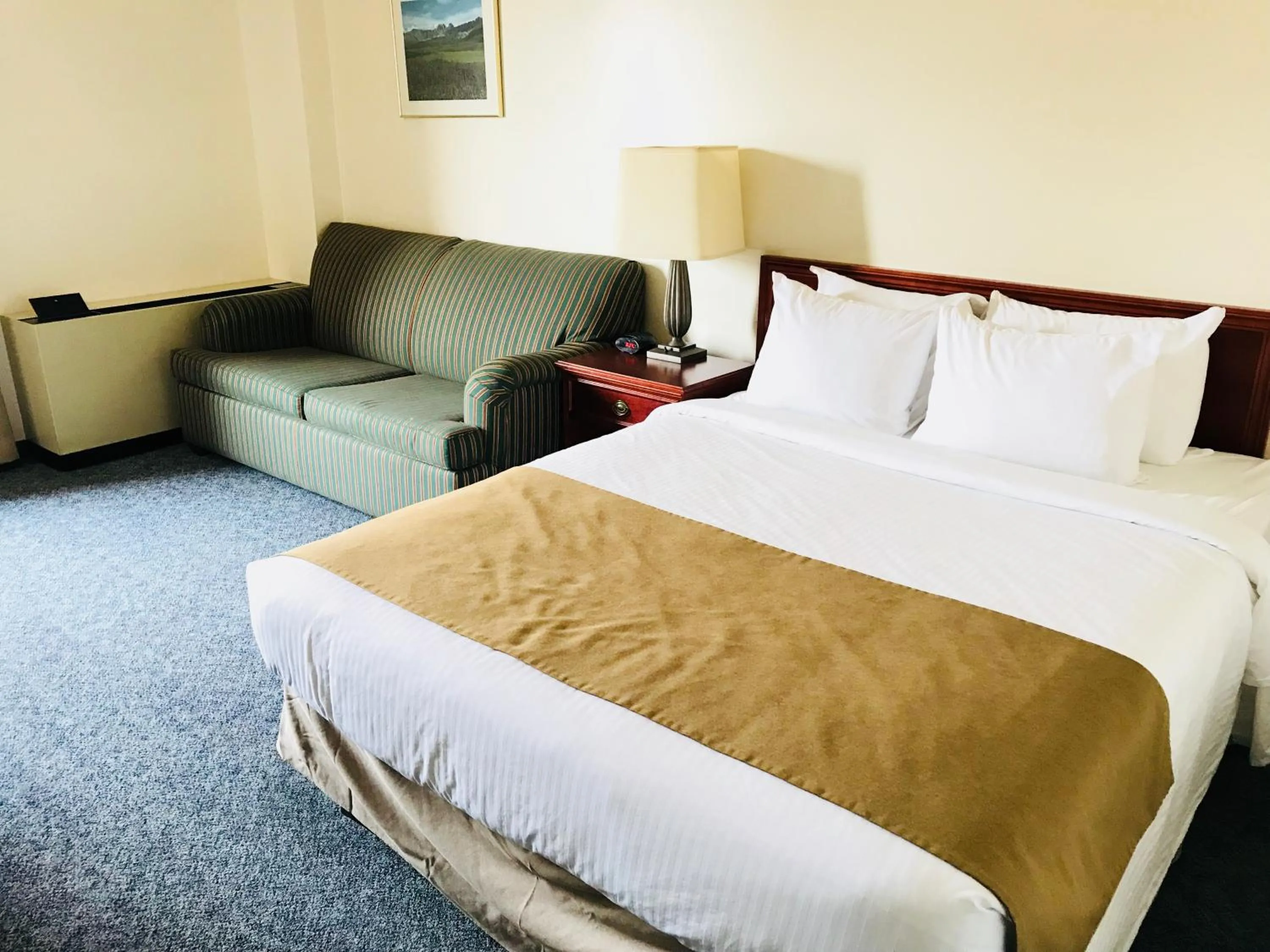 Bed in Northern Star Hotel & Convention Center