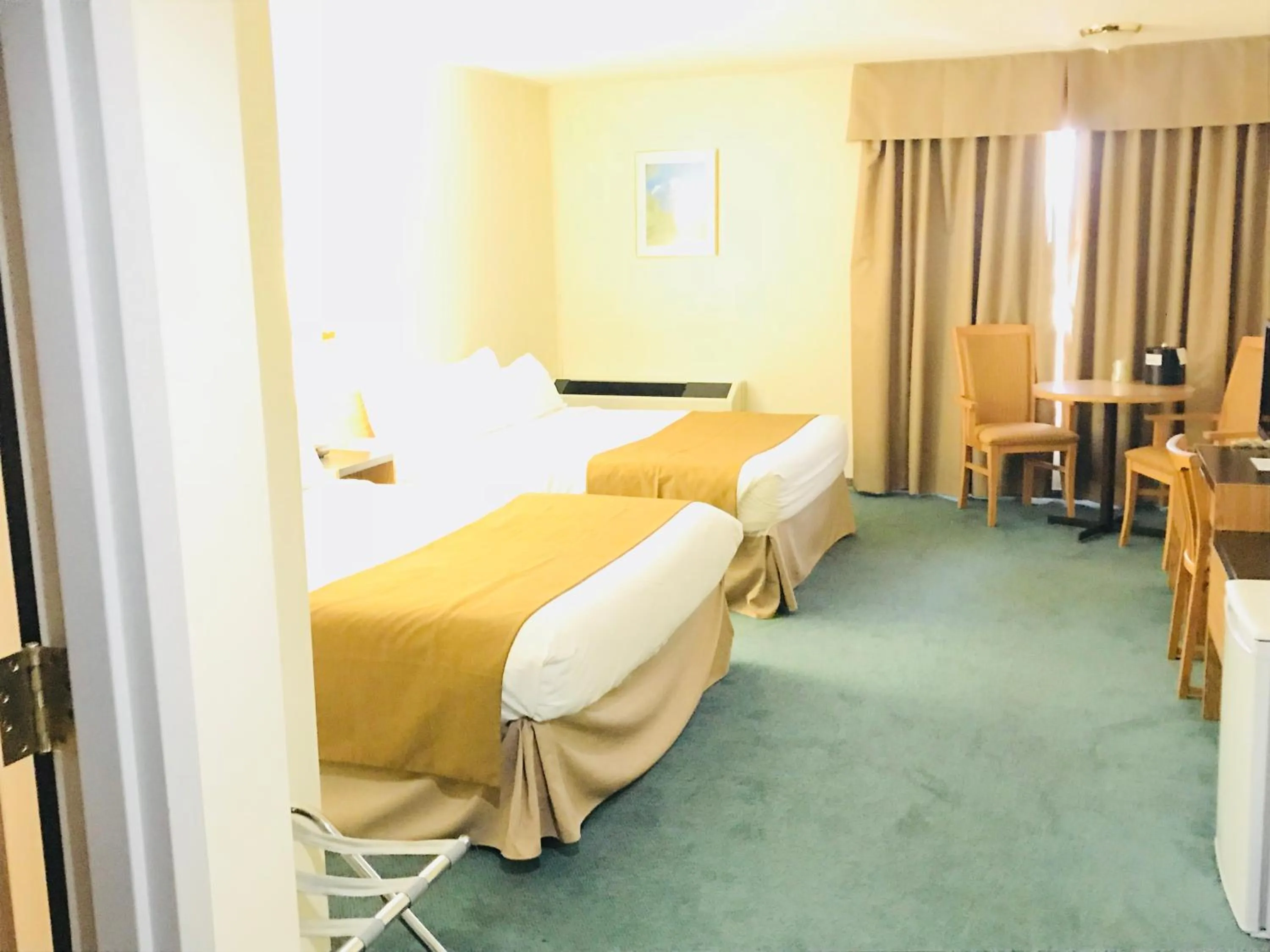 Bed in Northern Star Hotel & Convention Center