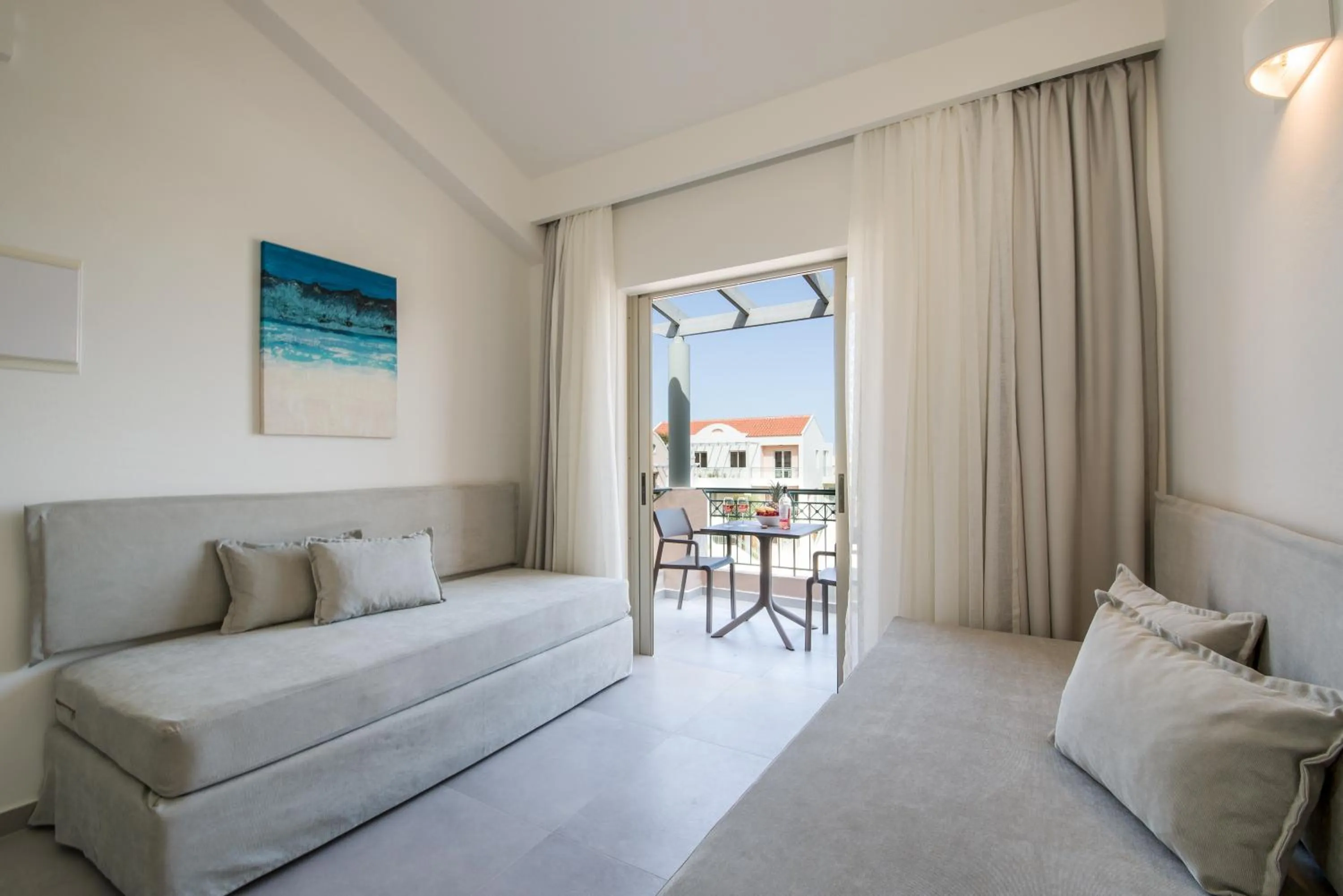 Seating area, Bed in Lotus Hotel Apartments