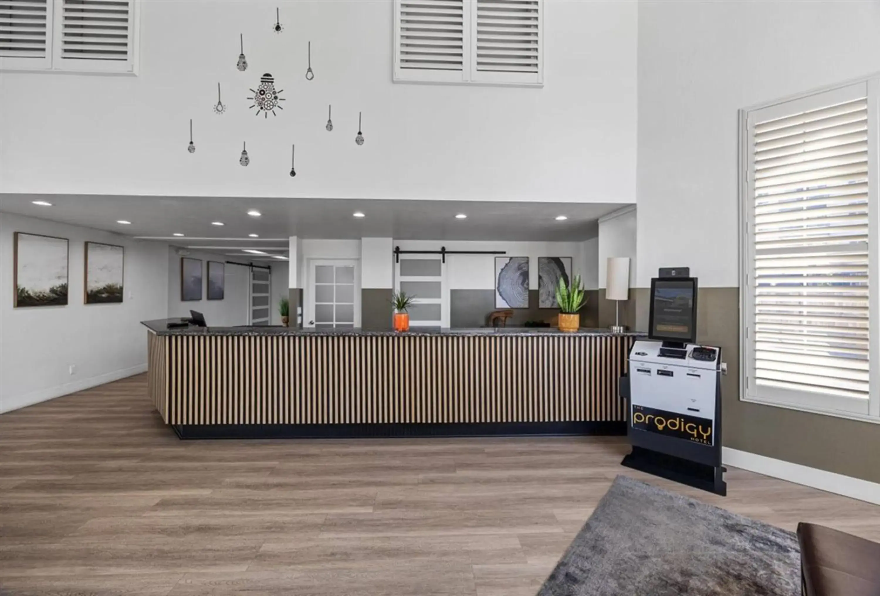 Lobby or reception in Prodigy Hotel, a Days Inn by Wyndham Lobby or reception in Prodigy Hotel, a Days Inn by Wyndham