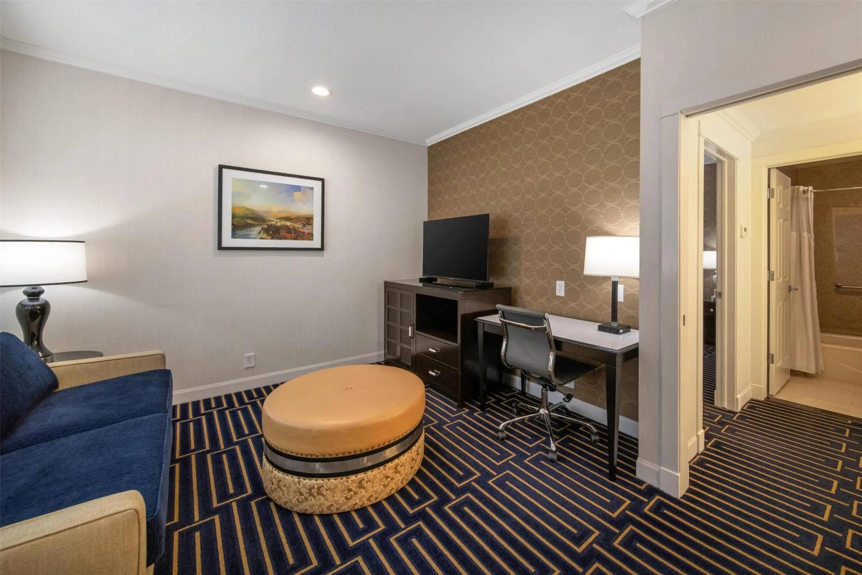 Bedroom in Best Western Plus Palm Court Hotel