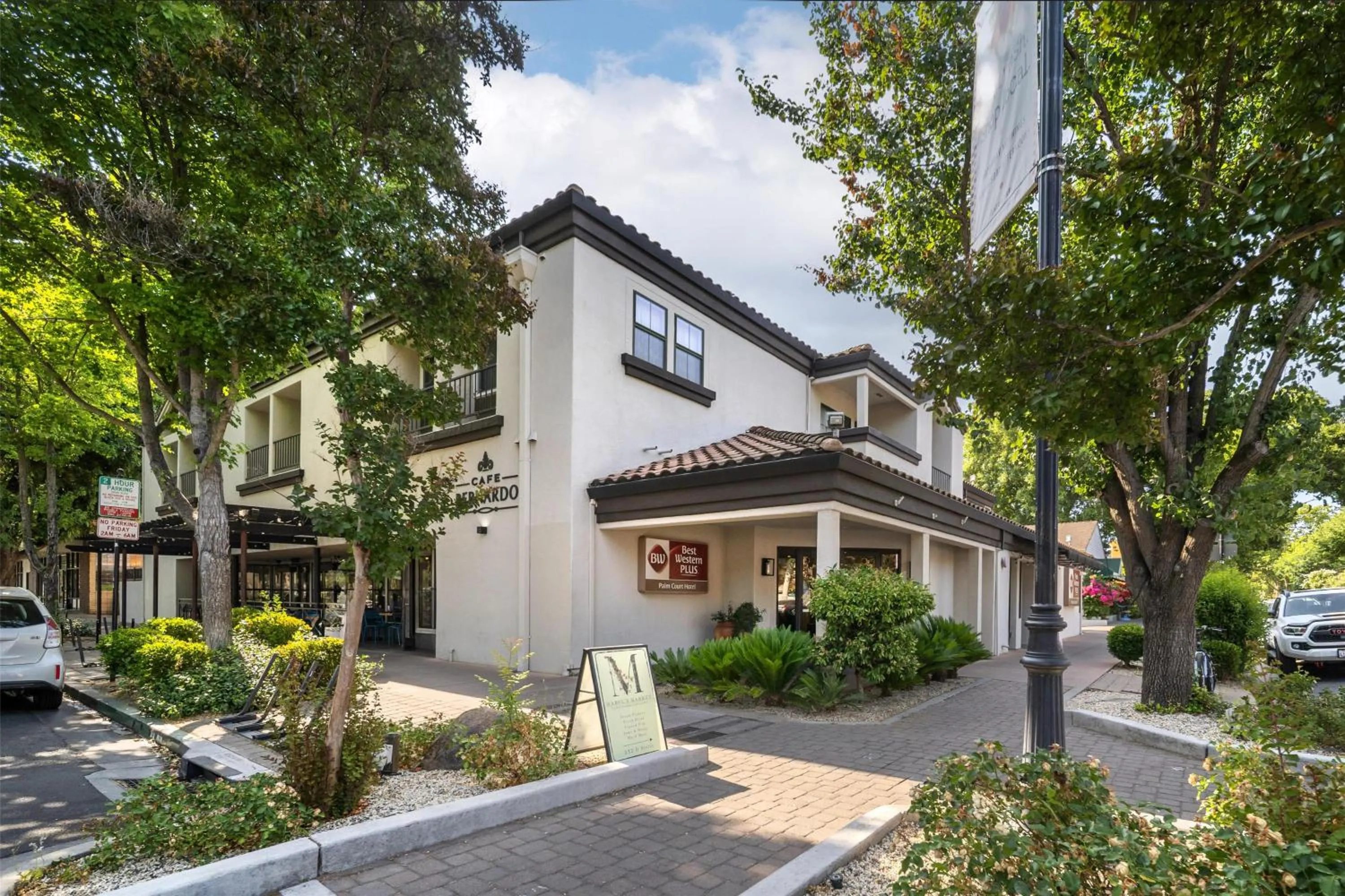 Property building in Best Western Plus Palm Court Hotel