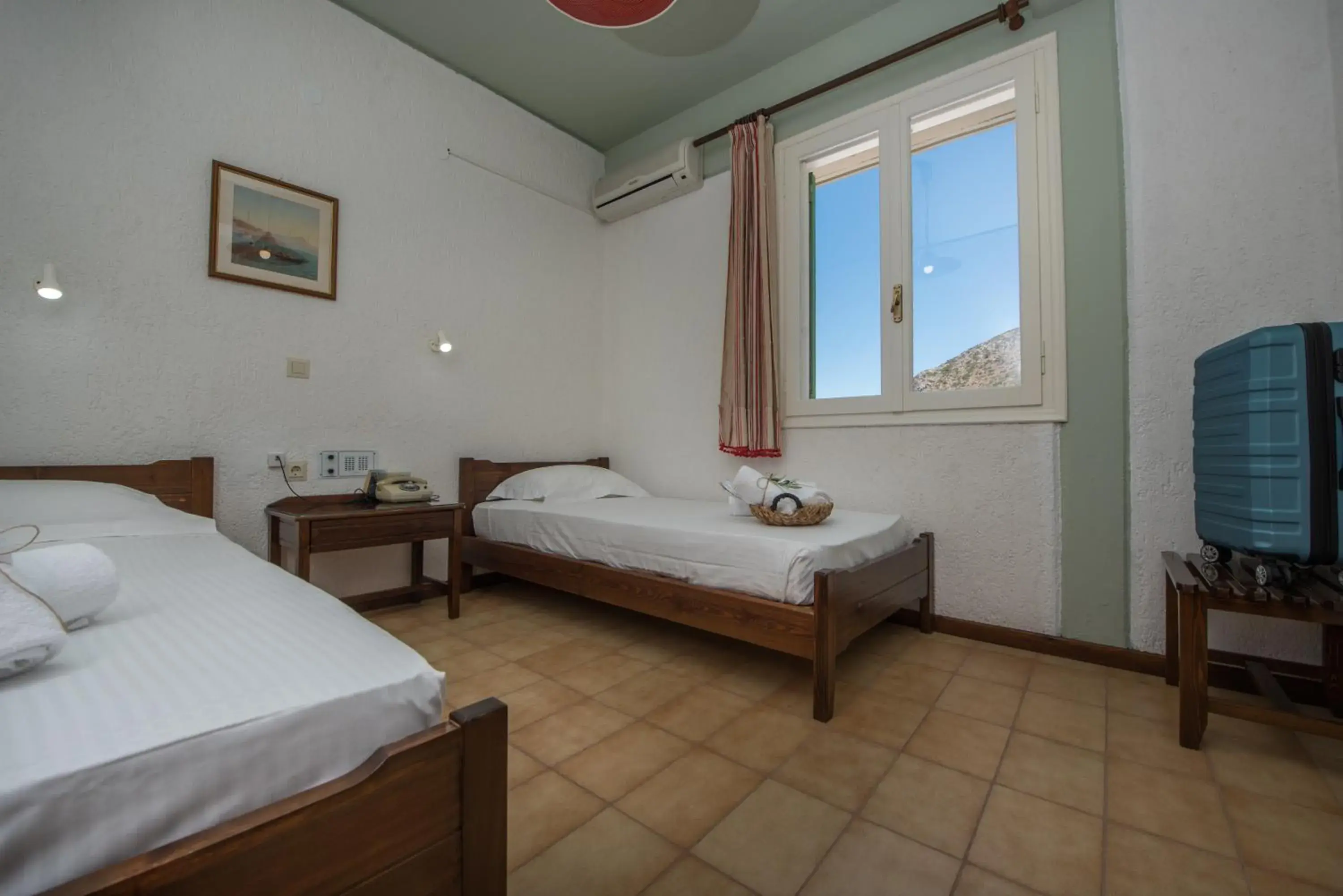 Standard Quadruple Room - single occupancy in Mitos Village Standard Quadruple Room - single occupancy in Mitos Village