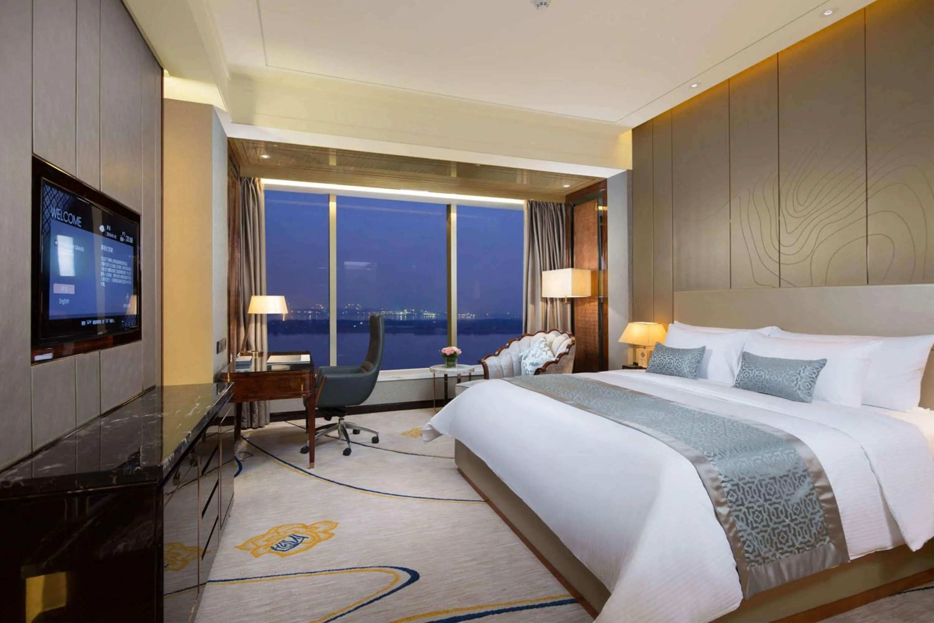Photo of the whole room, Bed in Wyndham Grand Foshan Gaoming