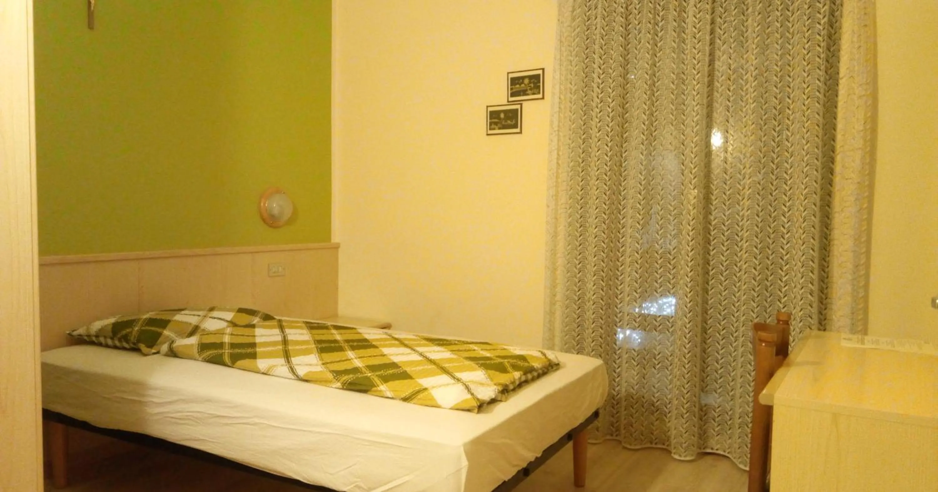 Bedroom in Garni Delia