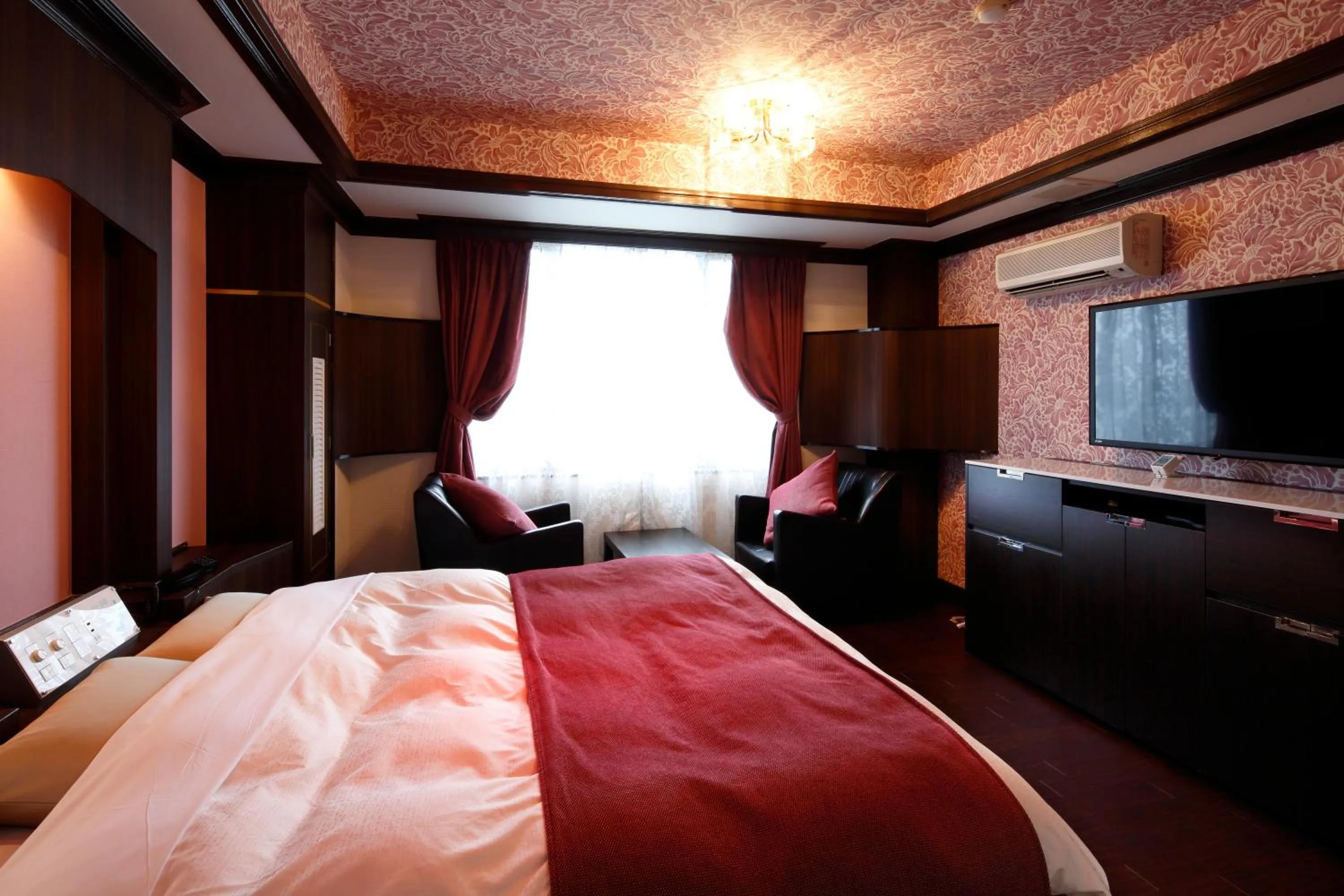 Bed in Hotel Sunset (Adult Only)