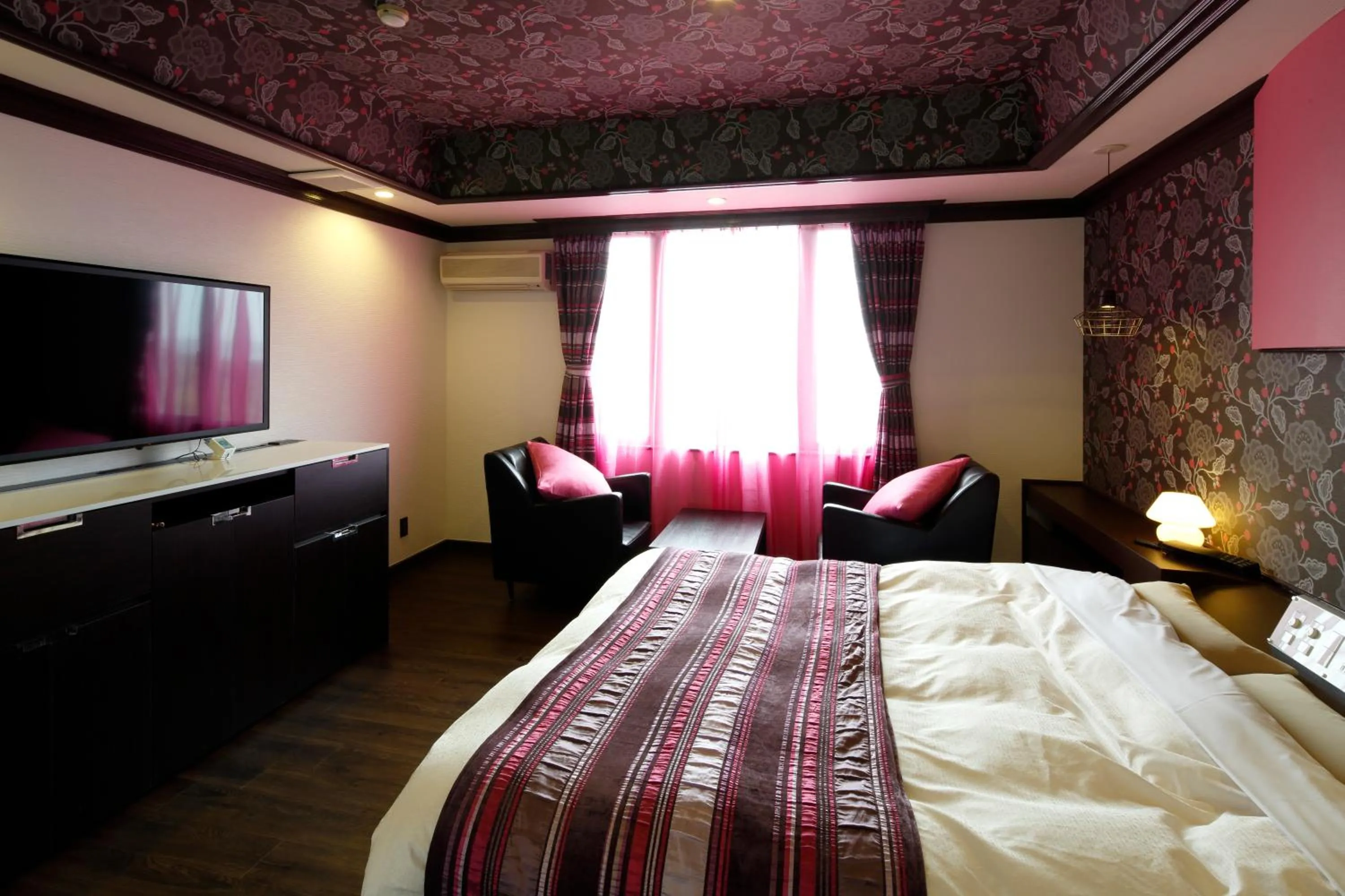 Bed in Hotel Sunset (Adult Only)