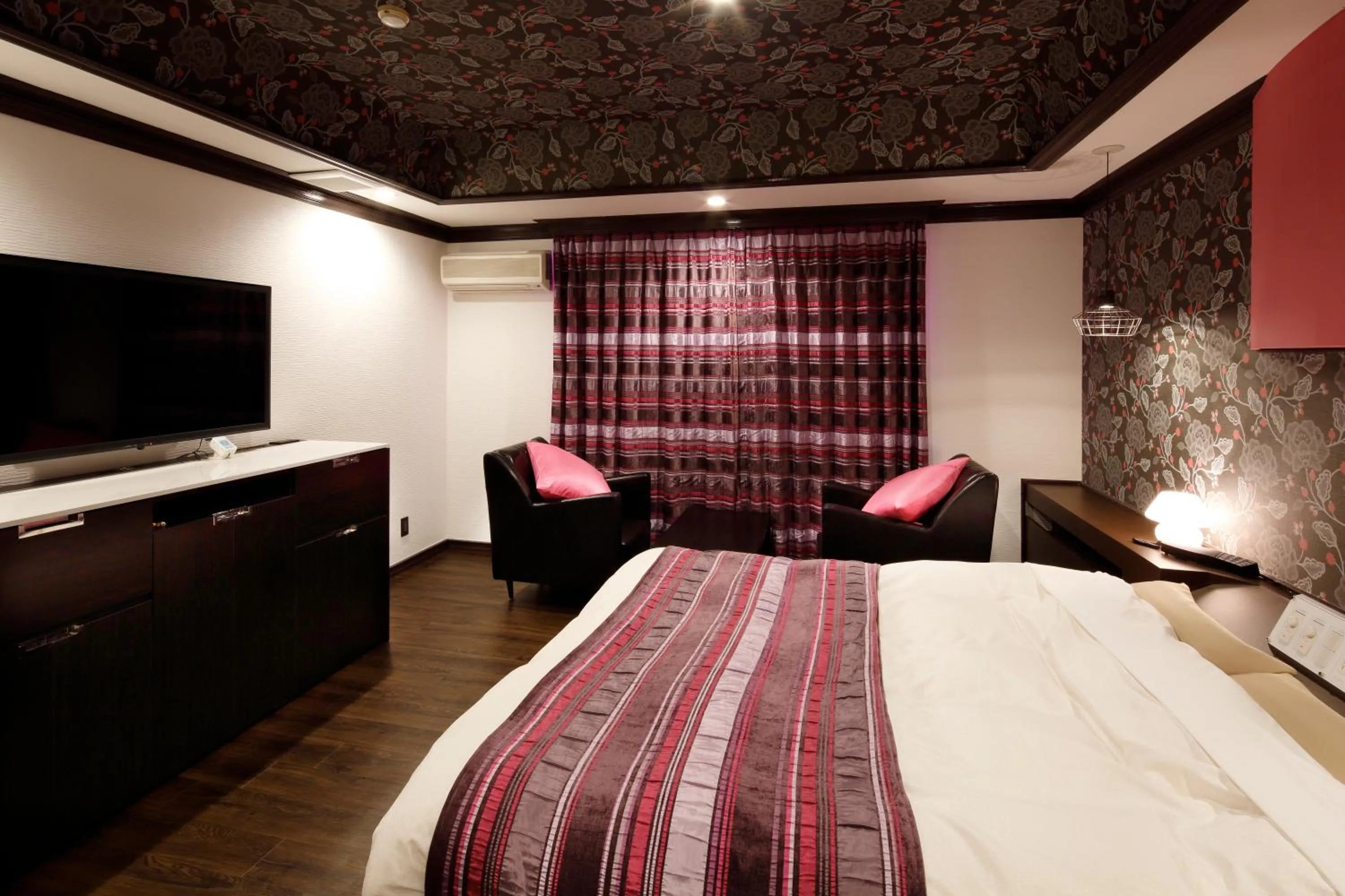 Bed in Hotel Sunset (Adult Only)