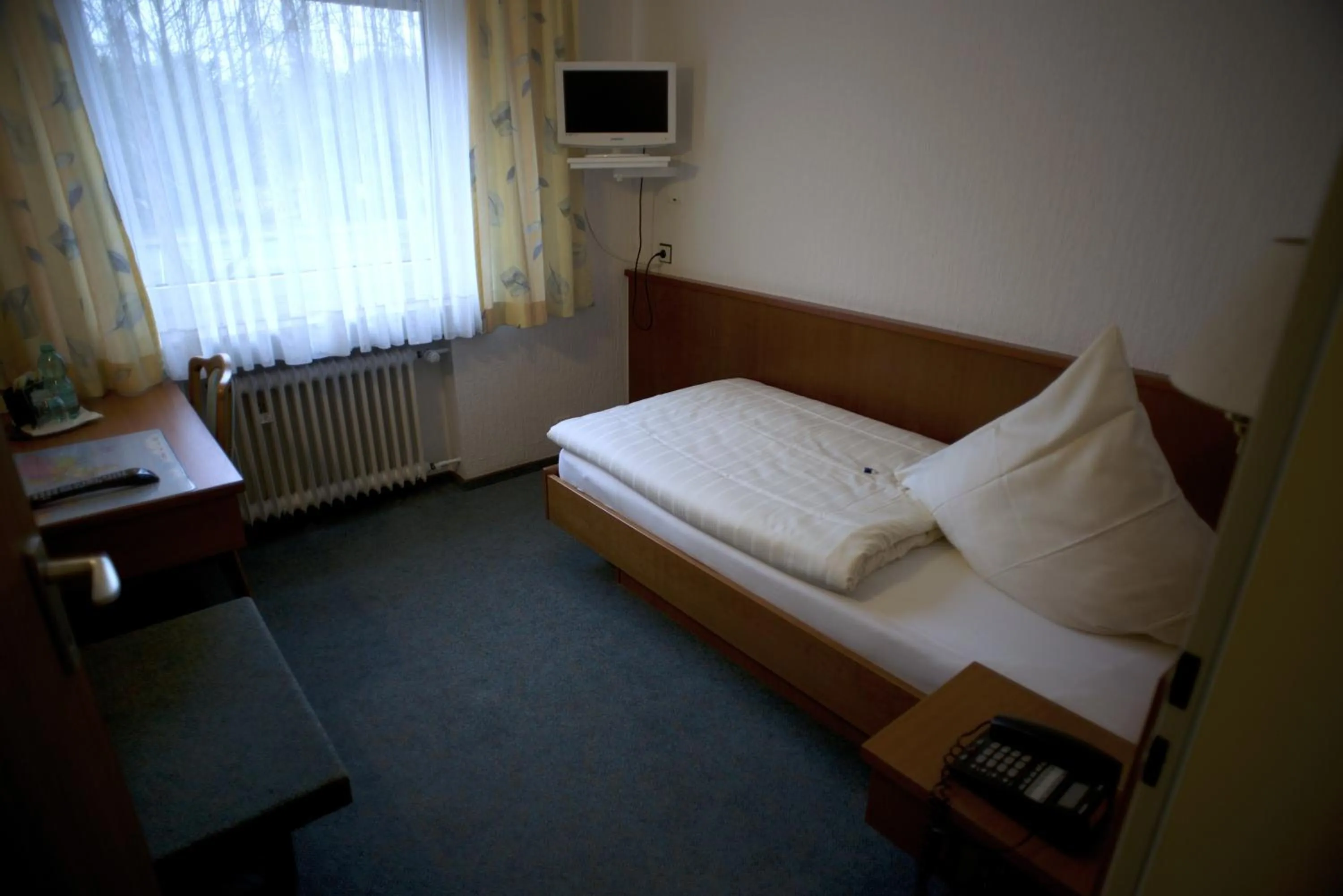 Bed in Hotel Marienhof Düsseldorf Neuss