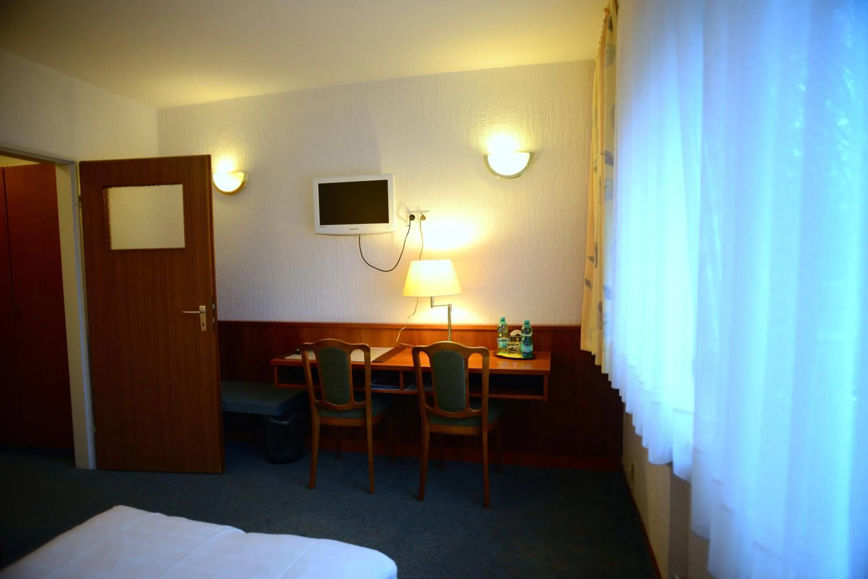 Photo of the whole room, Bed in Hotel Marienhof Düsseldorf Neuss