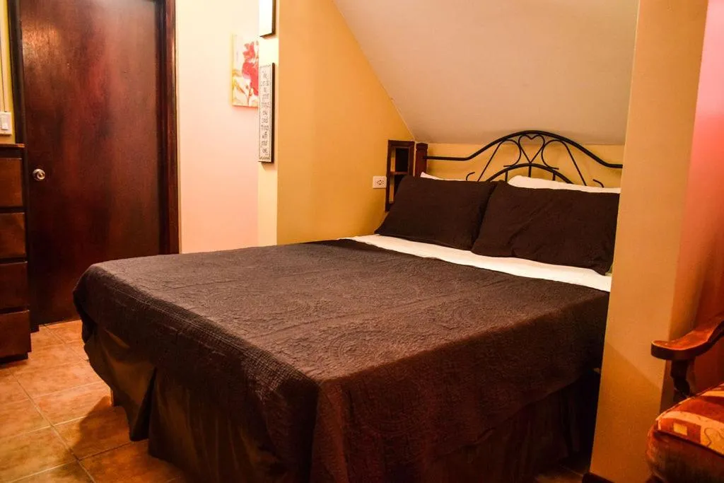Bed in Brownstone Guesthouses