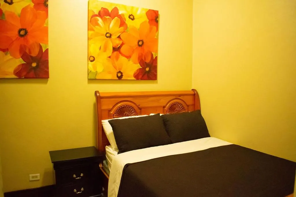 Bed in Brownstone Guesthouses