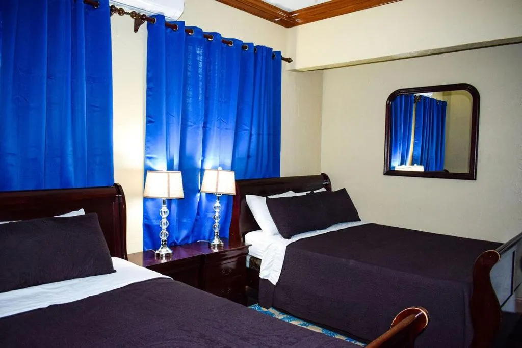 Bed in Brownstone Guesthouses