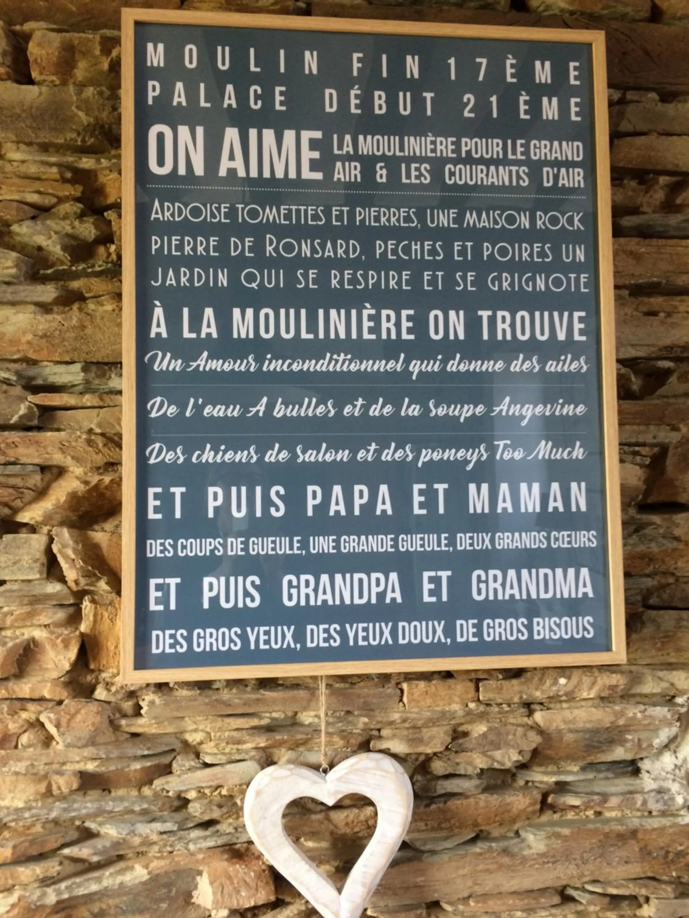 Property logo or sign in La Moulinière, jolie longère du XVIIè 25, chemin de la Source