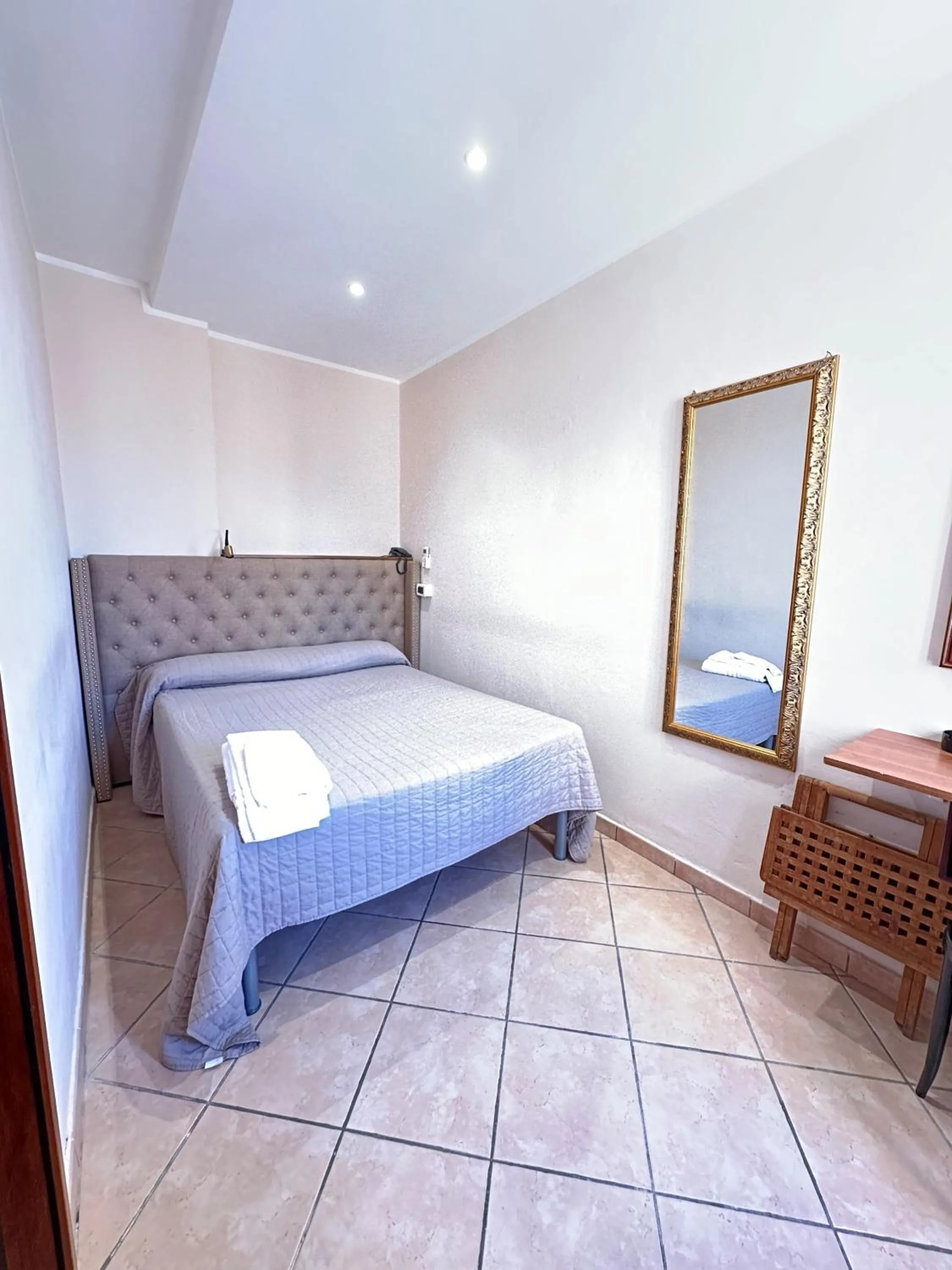 Bed in Hotel Svizzera