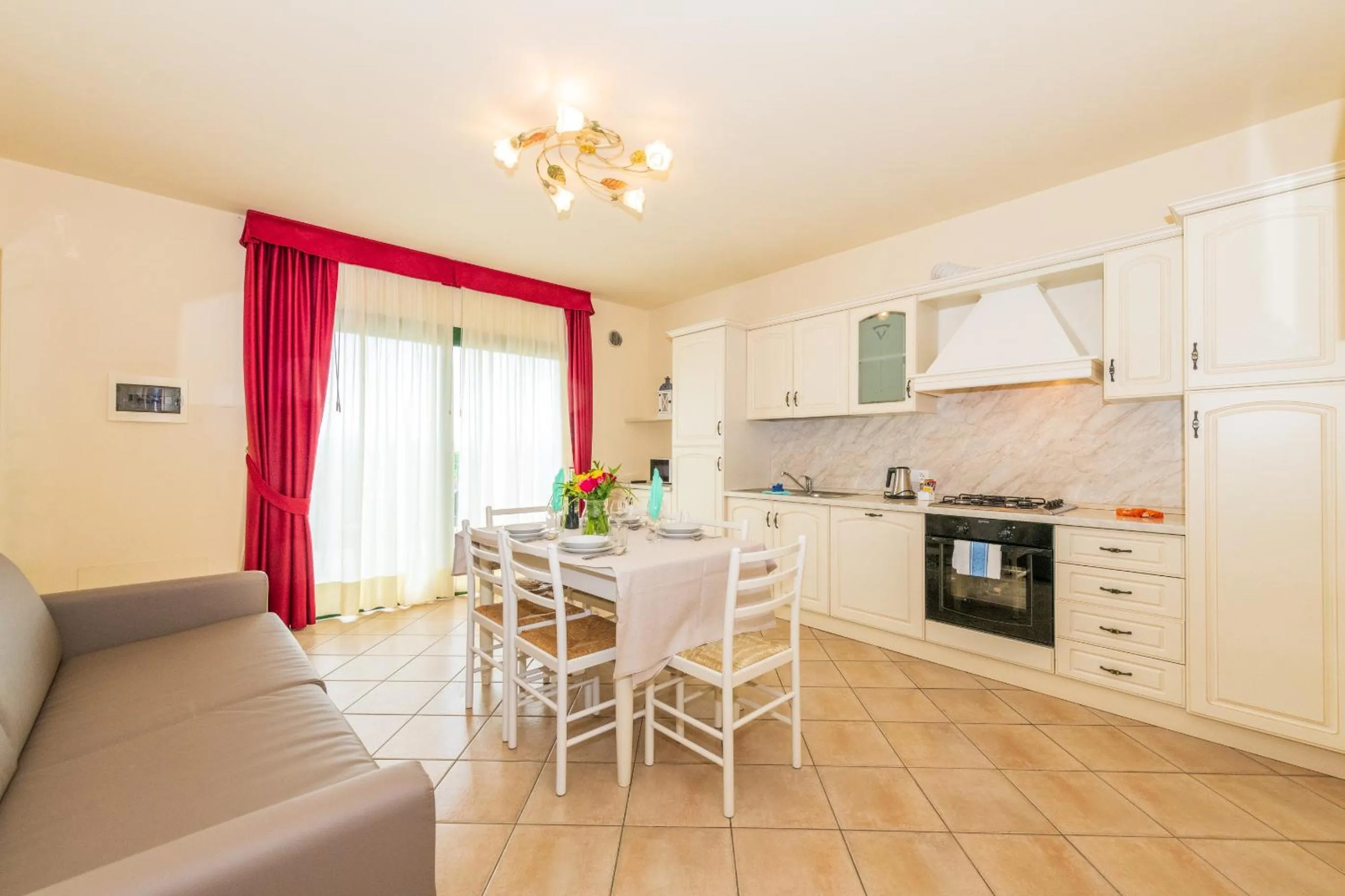 Kitchen or kitchenette in Bertoletta Village Apartments
