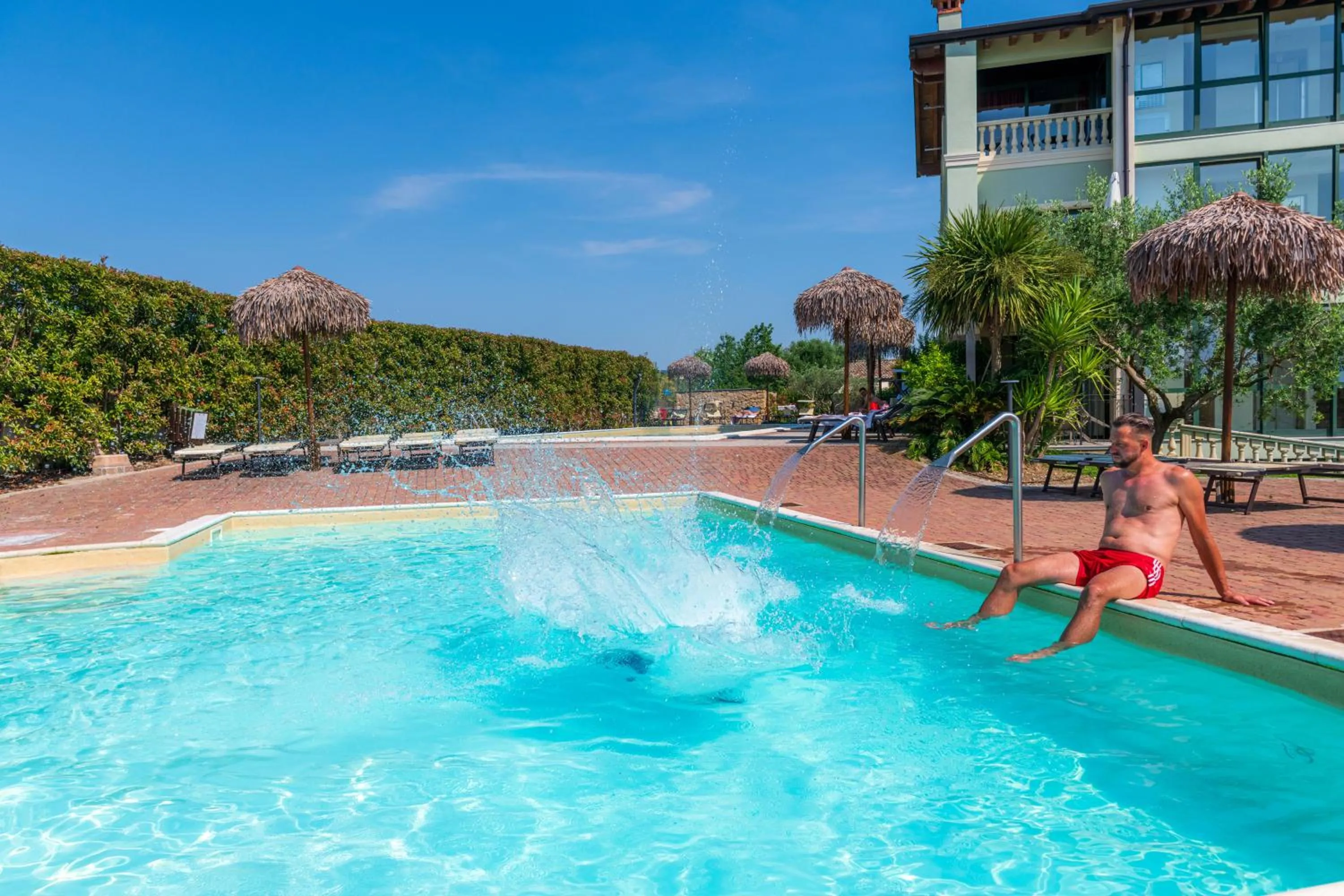 Swimming pool in Bertoletta Village Apartments