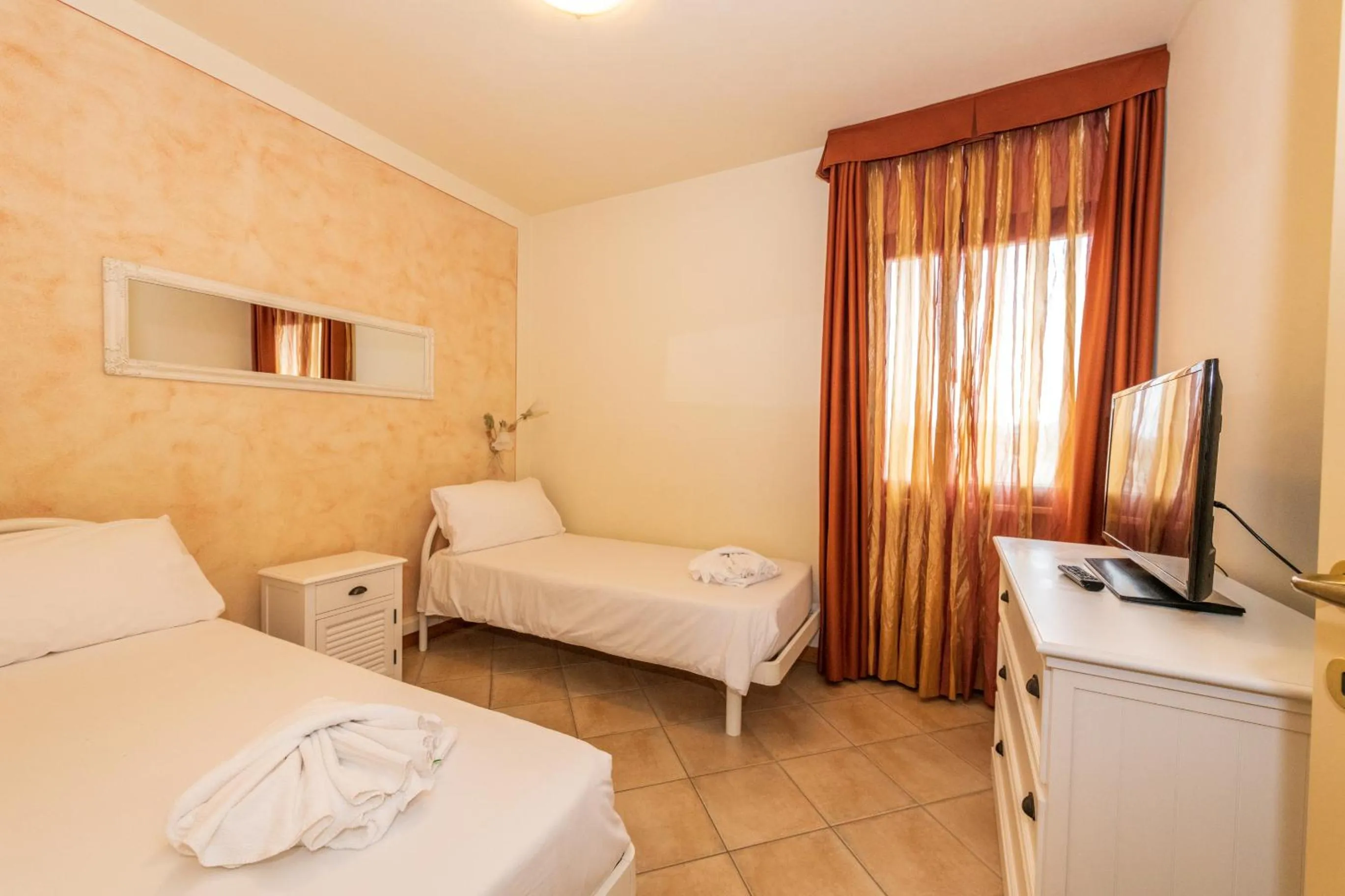 Bedroom, Bed in Bertoletta Village Apartments