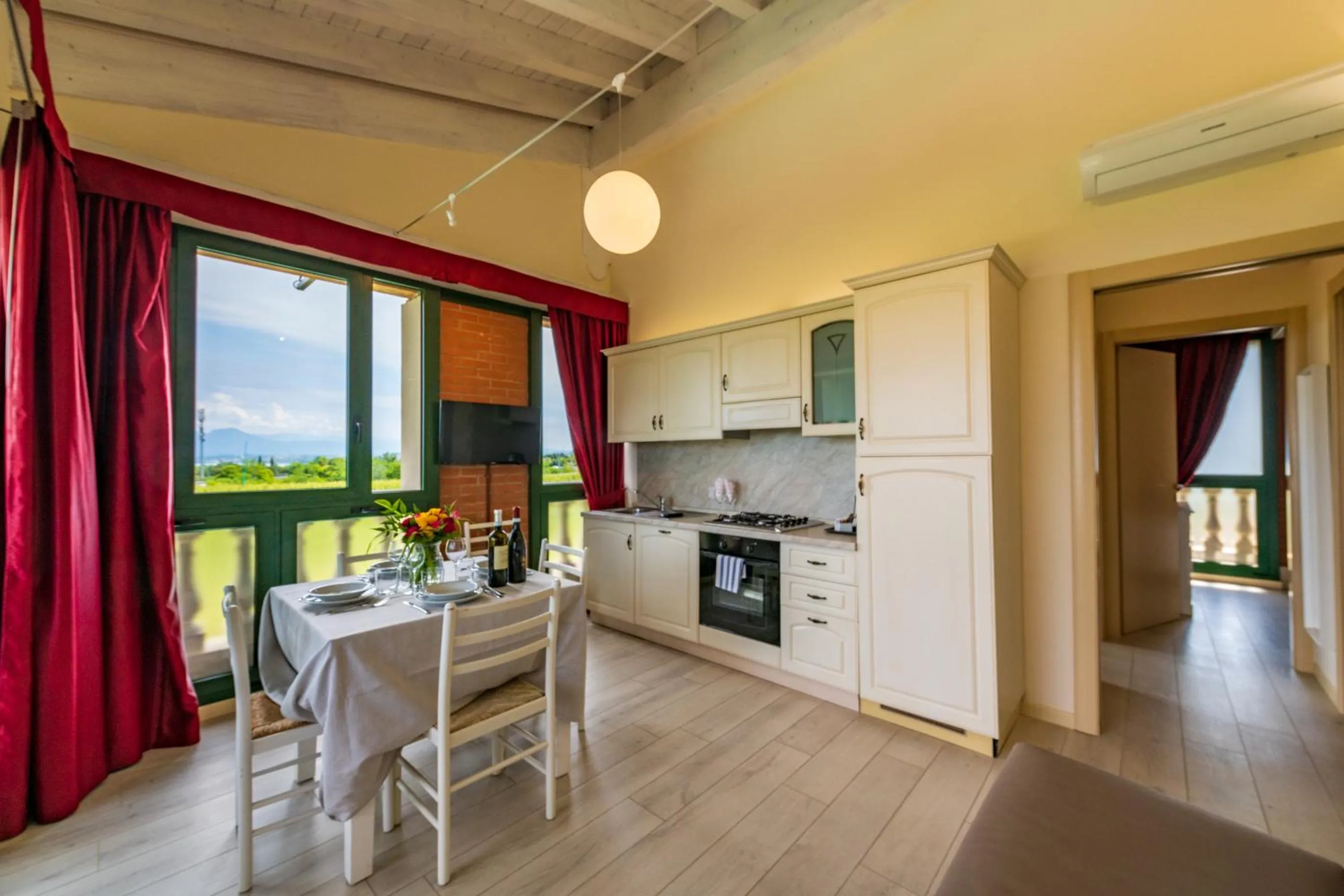 Kitchen or kitchenette in Bertoletta Village Apartments