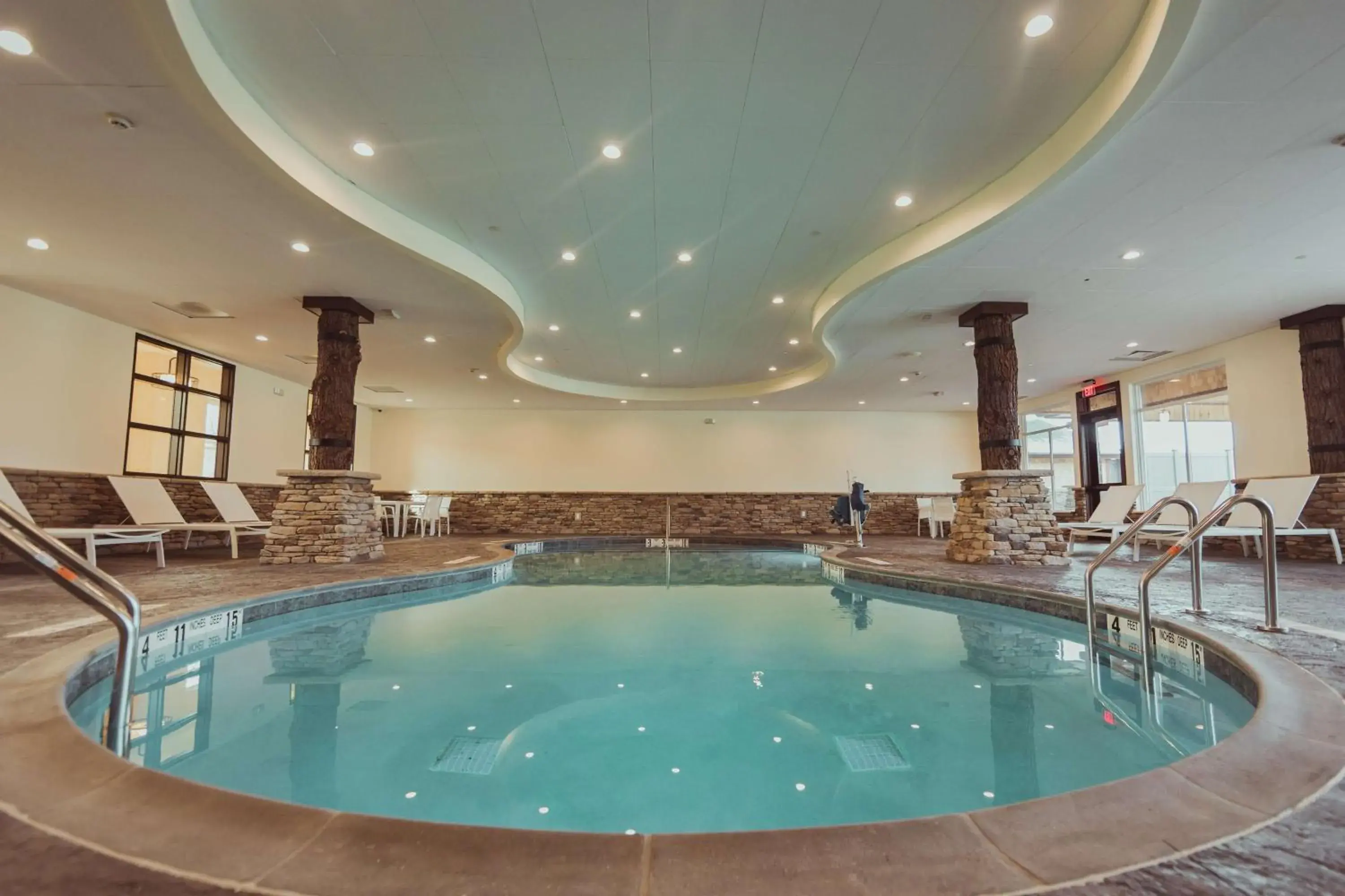 Pool view in Tailwater Lodge Altmar, Tapestry Collection By Hilton Pool view in Tailwater Lodge Altmar, Tapestry Collection By Hilton