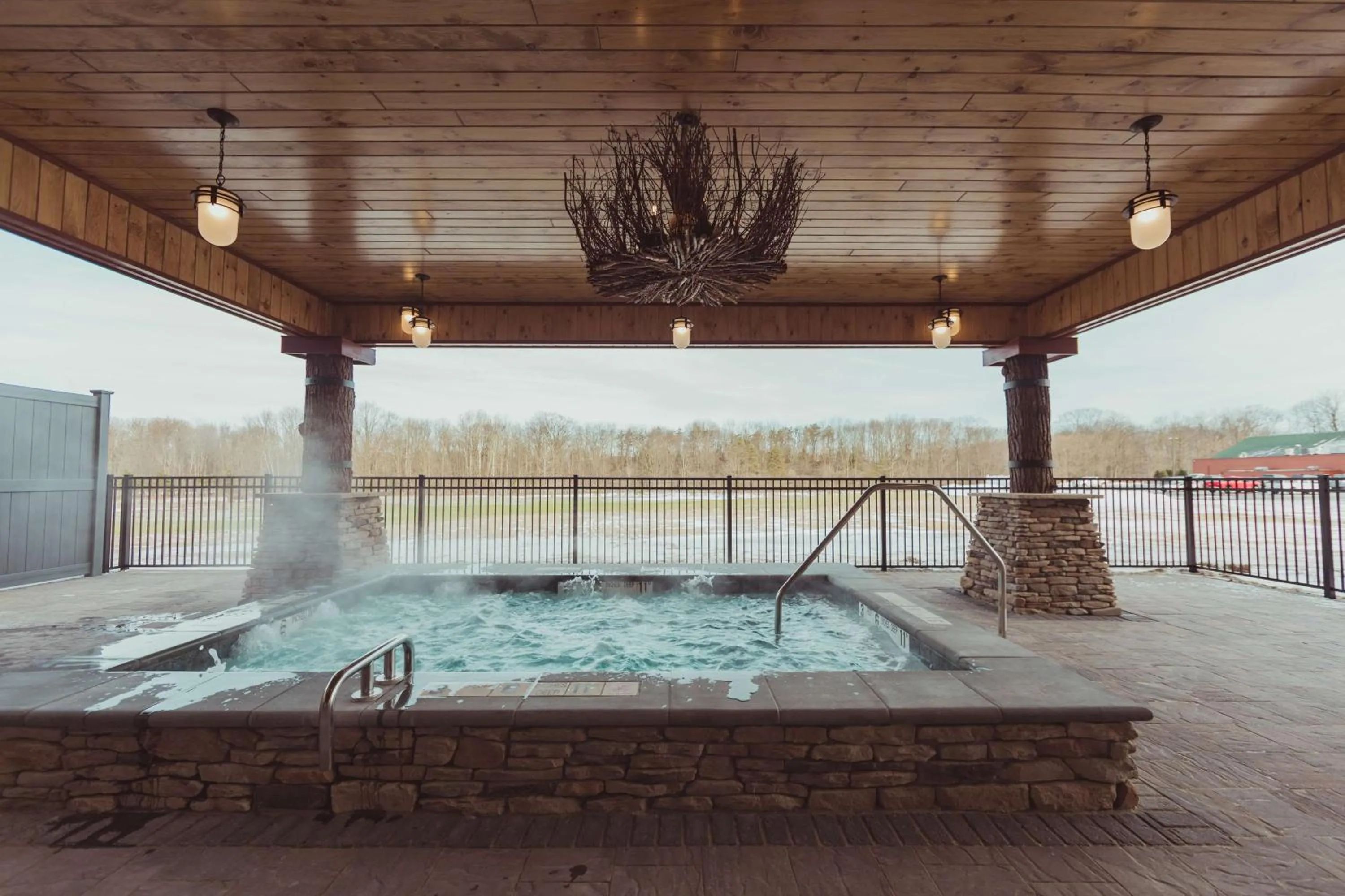 Hot Tub in Tailwater Lodge Altmar, Tapestry Collection By Hilton