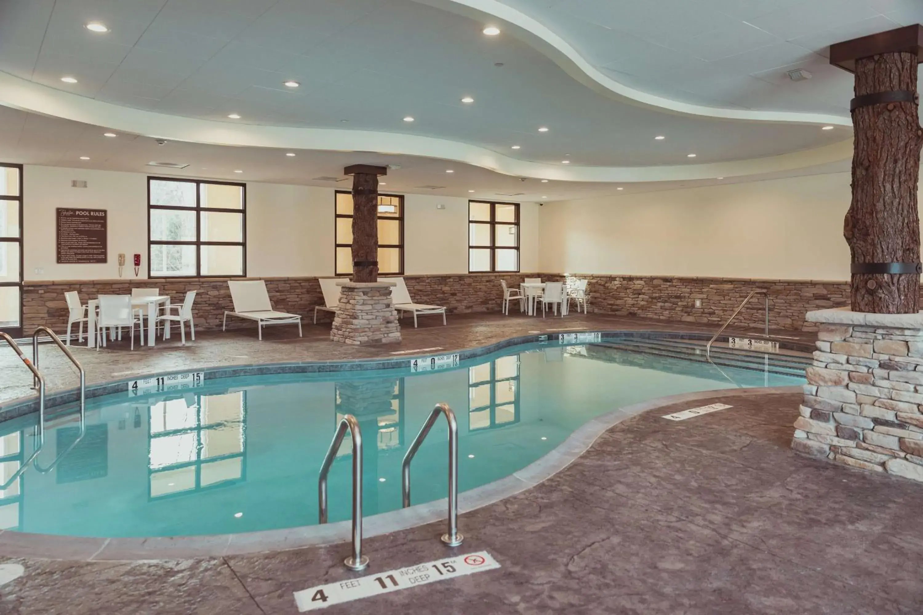 Pool view in Tailwater Lodge Altmar, Tapestry Collection By Hilton Pool view in Tailwater Lodge Altmar, Tapestry Collection By Hilton