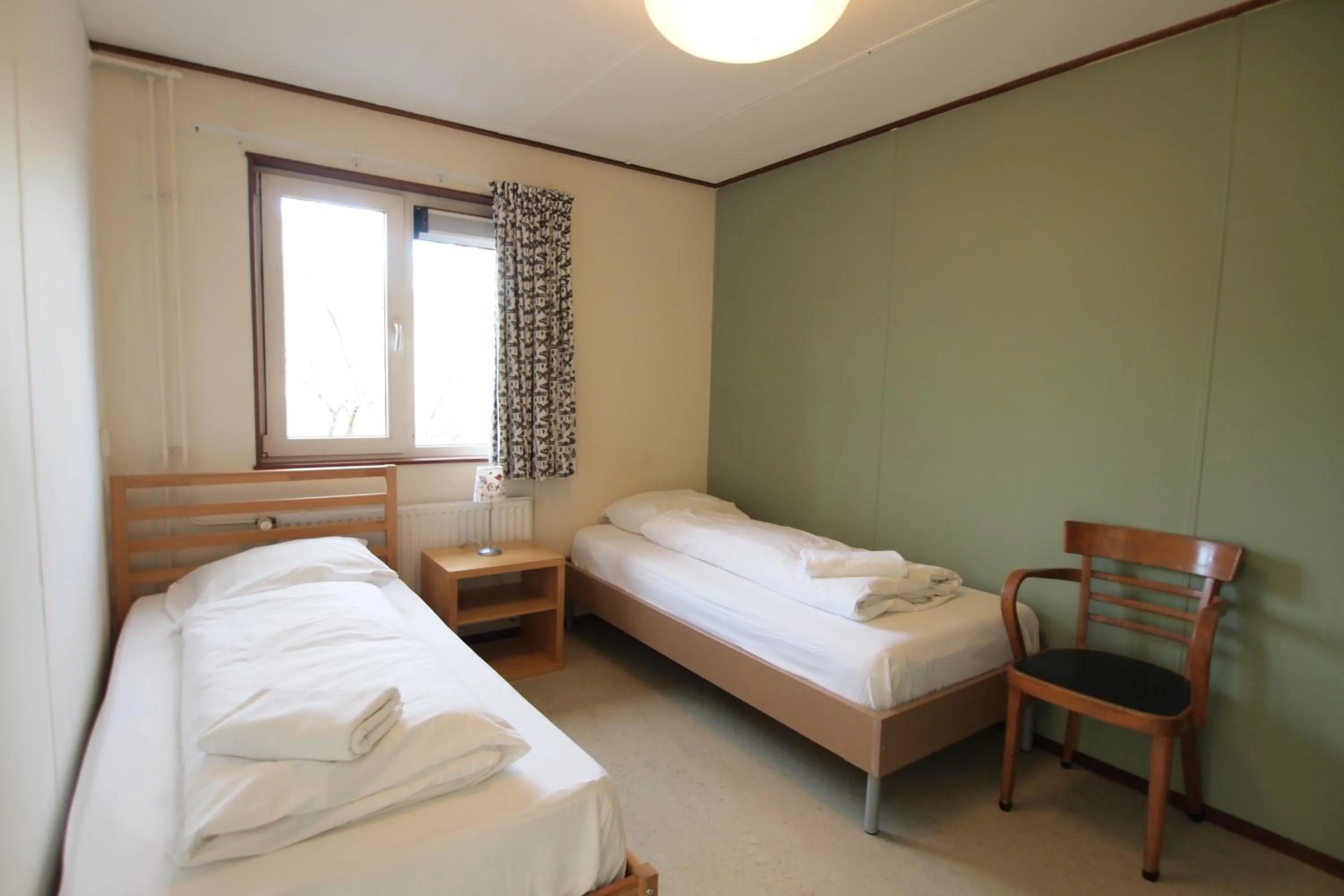 Bed in Amsterdam Farm Lodge