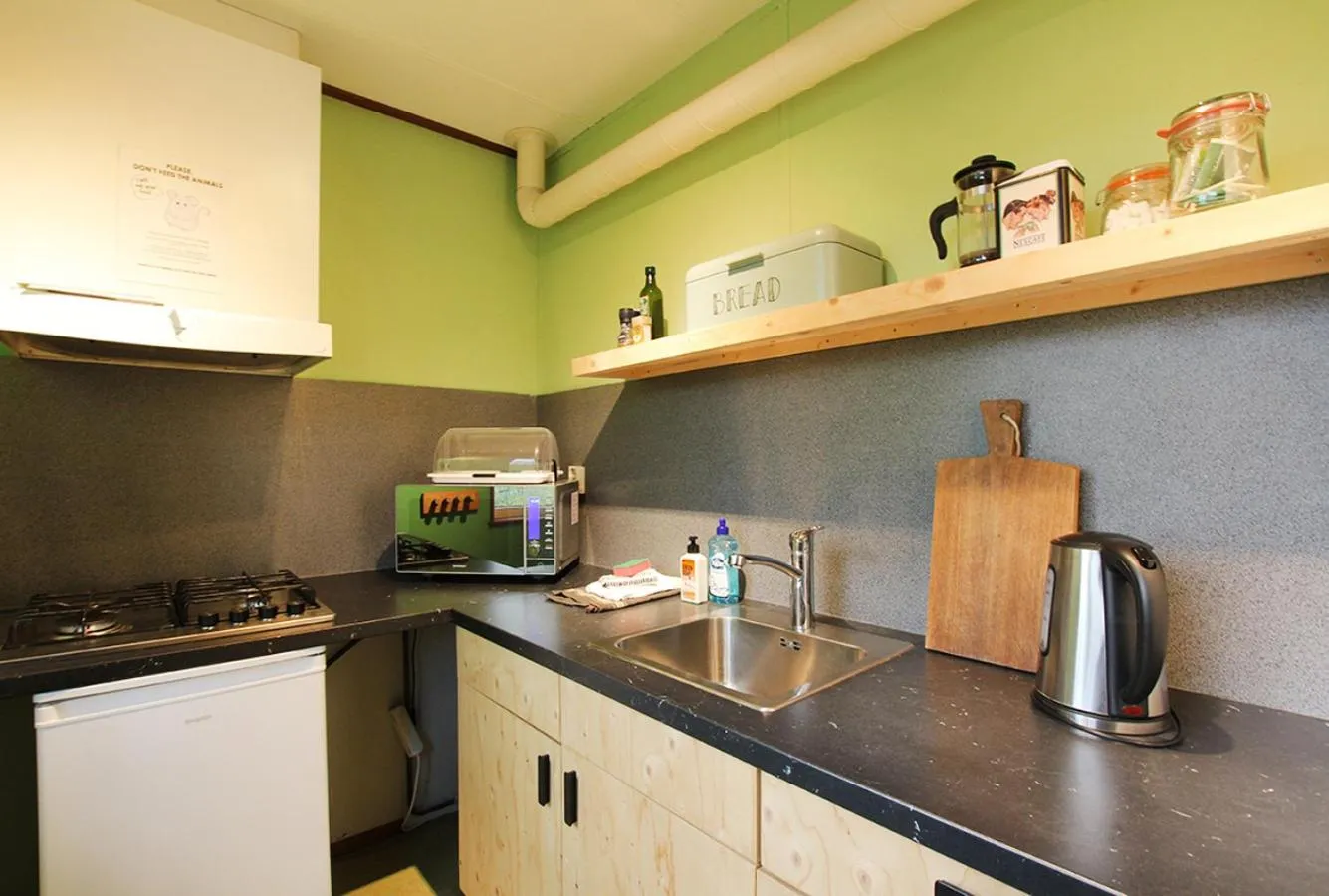 Kitchen or kitchenette in Amsterdam Farm Lodge