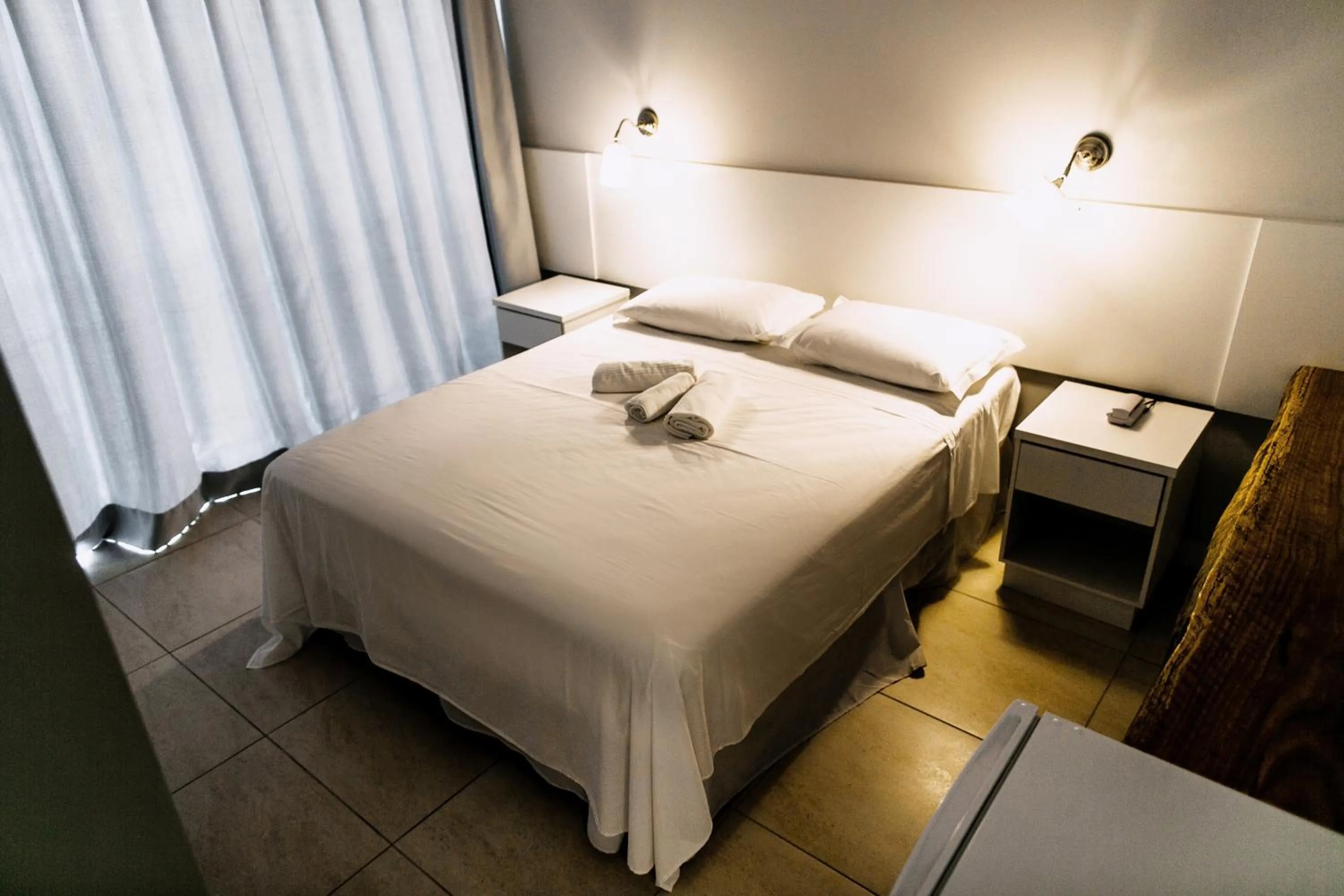 Photo of the whole room, Bed in Florinn Praia Hotel