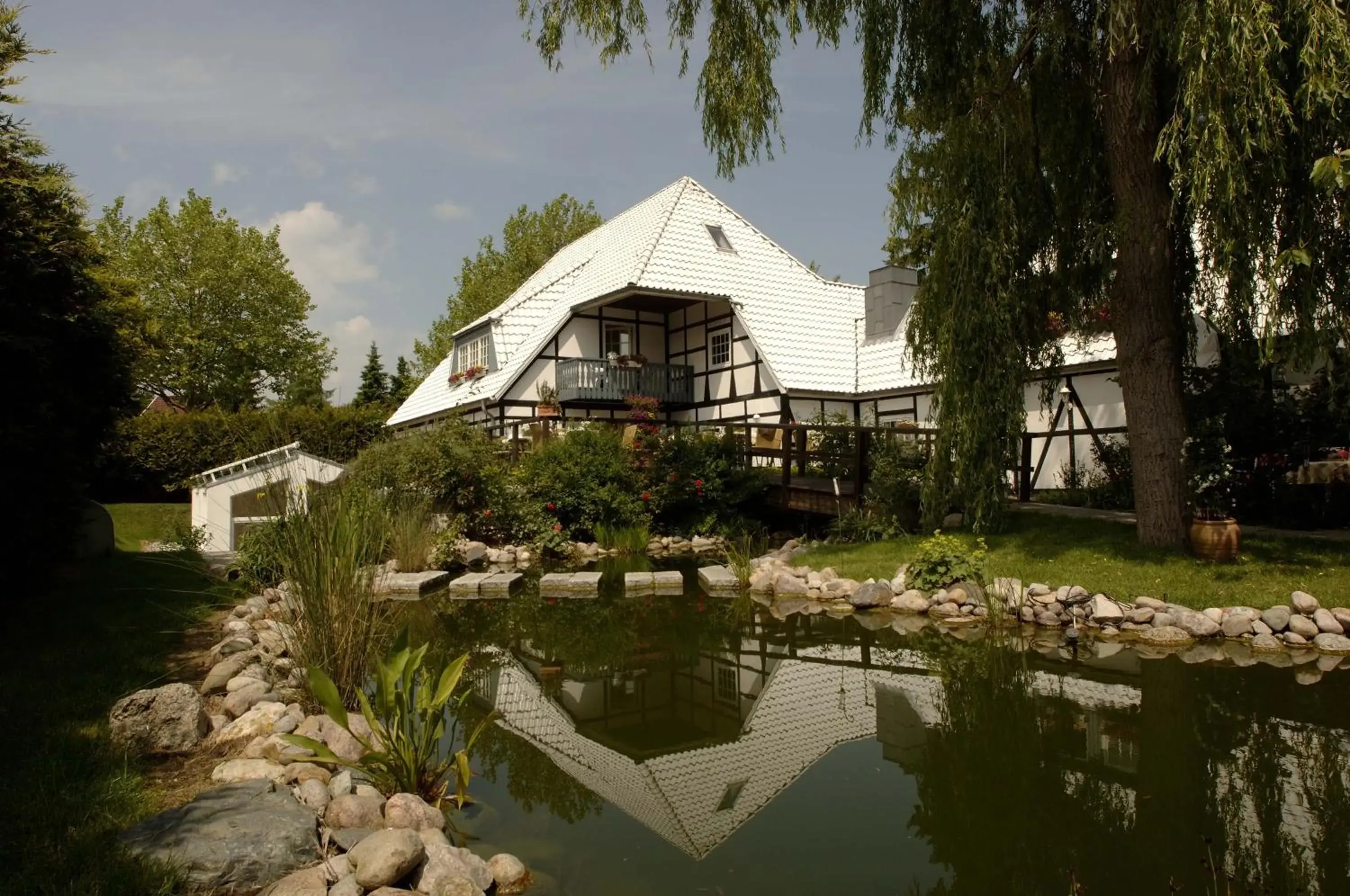 Garden, Property Building in Hotel Weisser Hof